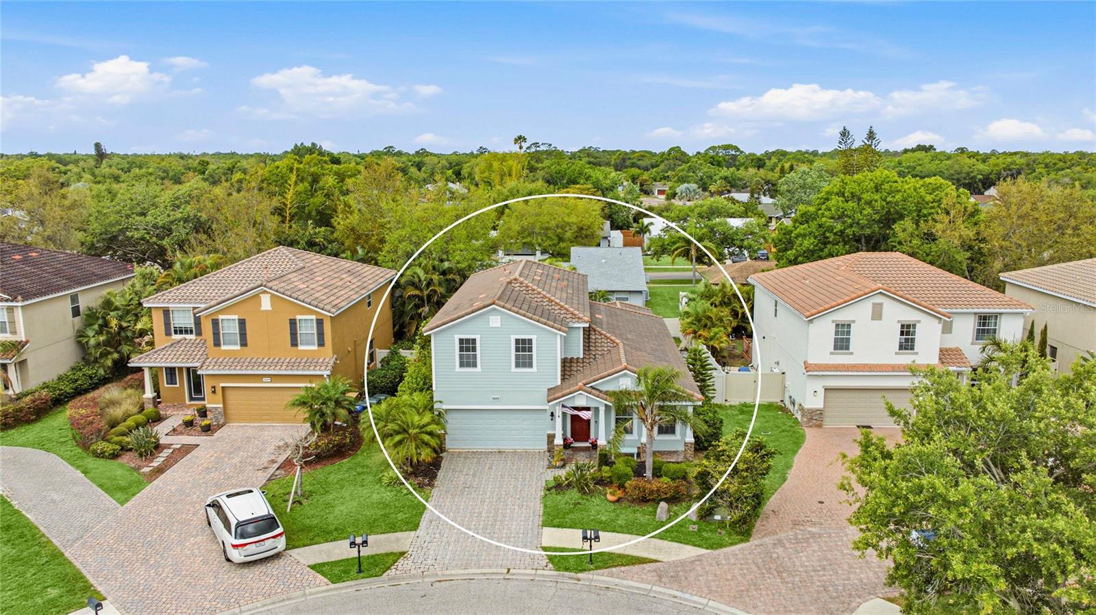 **THIS PROPERTY QUALIFIES FOR A 1% LENDER INCENTIVE IF USING PREFERRED LENDER. INQUIRE FOR MORE DETAILS.** Welcome to this beautifully maintained 4-bedroom, 2.5-bathroom pool home tucked away on a quiet cul-de-sac in the Oak Vistas community. Offering over 2,900 sq. ft. of living space, this two-story home features a functional layout designed for both everyday living and entertaining. Inside, the home opens to a welcoming dining area complete with a custom dry bar and wine cooler, creating a great space to host. The layout flows naturally into the kitchen and main living areas. The kitchen is equipped with 42-inch wood cabinetry, granite countertops, stainless steel appliances, and a large center island with ample prep and seating space. The main living area connects seamlessly to the outdoor space, enhancing the home’s open feel. The primary suite is located on the main level and offers a spacious layout with a massive walk-in closet. The upgraded primary bathroom features dual sinks, modern finishes, and dual shower heads. Upstairs, you will find three additional bedrooms along with a large bonus loft space, ideal for a media room, home office, or flexible living area. Step outside to a private, screened-in pool area with a fenced backyard, perfect for relaxing or entertaining. The cul-de-sac setting adds to the home’s quiet and private feel. Conveniently located near UTC, I-75, shopping, dining, and Gulf beaches, this home offers a prime location with low HOA fees and no CDD.