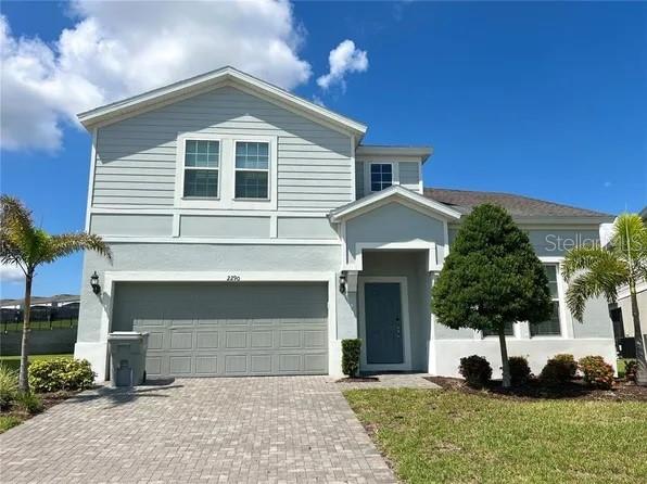 Nestled within the gated Windsor Island Resort in Davenport, 2290 Lelani Cir places you moments from shopping, restaurants, theme parks, major roads, and the airport. This new listing combines a resort-style address with a fully furnished, turn-key home designed for vacation living or short-term rental income.

Offering 4,025 square feet, this spacious residence features eight bedrooms and six bathrooms, leaving plenty of room for the whole group. An open floor plan and soaring high ceilings give the interior a bright, airy quality, while hard flooring runs through the main living areas and cozy carpet adds warmth to each bedroom. Upstairs, a generous loft creates a flexible space for games, movie nights, or simply relaxing.

The kitchen sits at the heart of the home, complete with quartz counters, a tiled backsplash, and stainless steel appliances—ready for group dinners and easy entertaining. Conveniently located downstairs, the primary bedroom offers a private retreat just steps from the action.

Out back, a screened-in pool provides the perfect setting to unwind and cool off beneath the Florida sun.

Step beyond your door and Windsor Island Resort delivers true resort-style living. This gated community includes a 24-hour guarded gate, a stunning clubhouse, a lazy river, splash pool, bar, fitness center, volleyball, game room, tiki bar, cabanas, mini golf, and so much more. Short-term rentals are welcome, making this property an ideal getaway or a smart investment opportunity.

With its unbeatable location, incredible amenities, and move-in ready condition, this Davenport gem checks every box. Whether you're searching for a family vacation home or a rental property with strong earning potential, this one truly stands out. Schedule your private showing today and make it yours before it's gone!