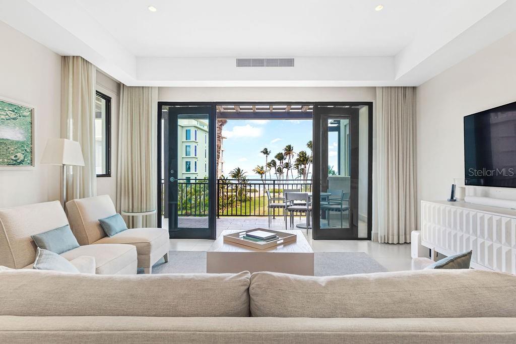 Stunningly situated in the idyllic location of Bahia Beach Residences, this beachfront condominium is what you've been waiting for and it's finally available. Located in the third floor of Las Ventanas II Condominium, you will definitely enjoy majestic views of the Atlantic Ocean from your own private terrace. 

An air of relaxed luxury pervades the interior of this unit which offers 3 bedrooms and 3 full bathrooms, spacious Living and Dining area that spills out to the covered terrace ideal for barbecues and entertaining. This home is sold fully furnished and equipped including a Smart Home Automation Package giving you complete control of lighting, air conditioning, home entertainment, security and more via a touch screen display. This property will be shown only on August 11, 12 and 13 by appointment only.