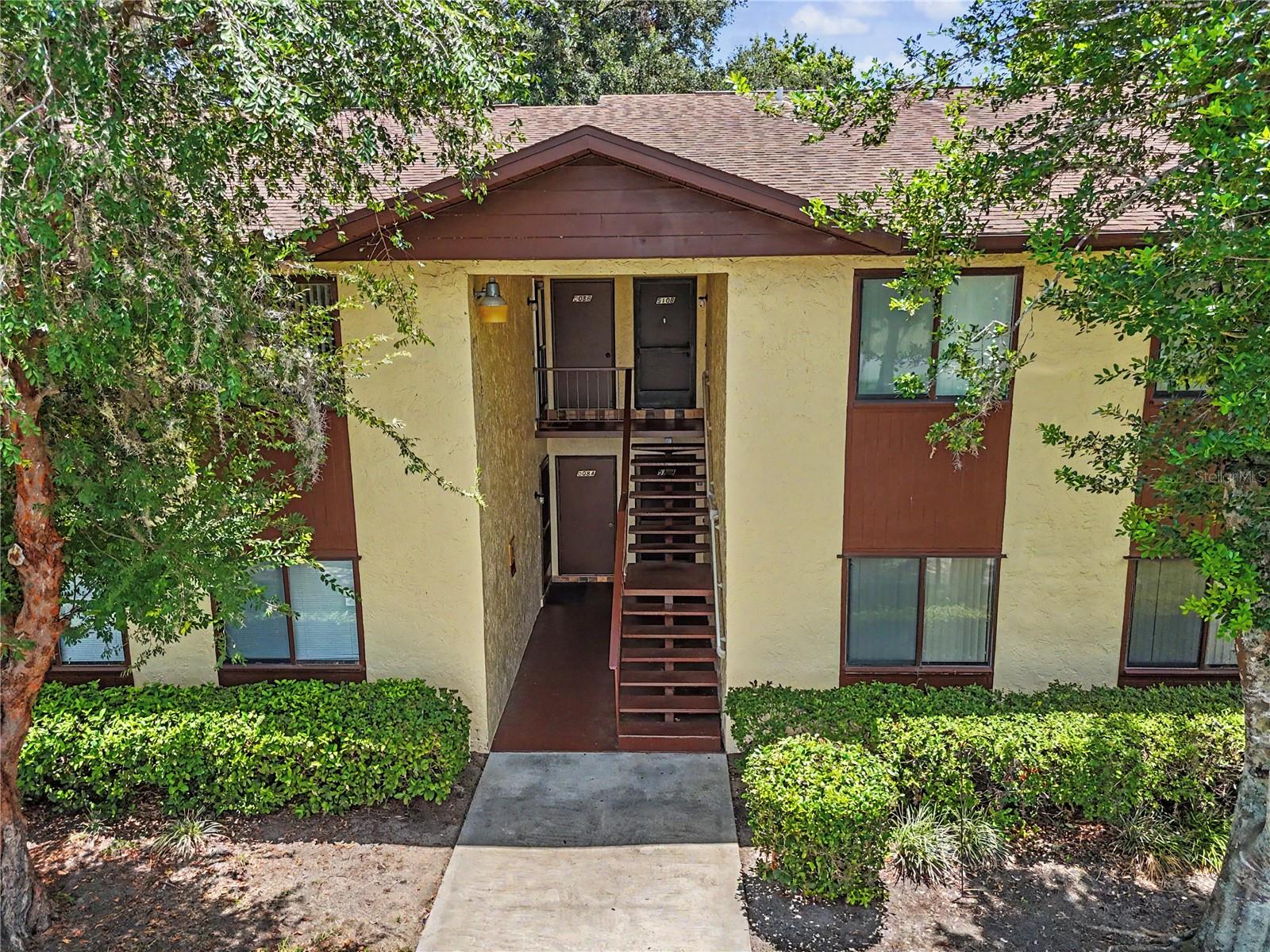 Welcome home to this beautifully updated 2-bedroom, 2-bath end-unit condo in the desirable 55+ community of Fairways at Silver Springs Shores, where low-maintenance living meets comfort, convenience, and a private pool view. From the moment you step inside, you’ll appreciate the spacious, light-filled layout, newer flooring installed just over a year ago, and the abundance of storage throughout, including two separate pantry areas that provide exceptional kitchen and household organization. The kitchen comes fully equipped with newer appliances, highlighted by a double oven that’s perfect for entertaining or preparing holiday meals, along with a refrigerator that’s only about a year old, microwave, dishwasher, and washer and dryer that are all included with the home. Major updates provide added peace of mind, including a 2022 HVAC system and a water heater that’s approximately a year and a half old. One feature you’ll especially appreciate is the indoor laundry room, conveniently accessed directly from the main living area rather than through the lanai, making everyday living more comfortable and convenient. The fully enclosed rear lanai creates the perfect space to enjoy your morning coffee, unwind with a good book, or simply relax while overlooking the sparkling community pool. Large bedrooms, generous closet space, designated parking, and the advantages of an end-unit location only add to this home’s appeal. The HOA takes care of exterior maintenance, roof maintenance, grounds maintenance, and trash service, giving you true lock-and-leave convenience so you can spend less time worrying about upkeep and more time enjoying the Florida lifestyle. Beyond the community, you’ll appreciate Ocala’s ideal location with easy access to shopping, restaurants, medical facilities, golf courses, parks, hiking and biking trails, the area’s beautiful natural springs, and convenient day trips to both Florida’s Gulf and Atlantic beaches as well as Orlando’s world-famous attractions. Whether you’re searching for a full-time residence or the perfect seasonal retreat, this move-in-ready condo offers the comfort, peace of mind, and carefree Florida lifestyle you’ve been waiting for.