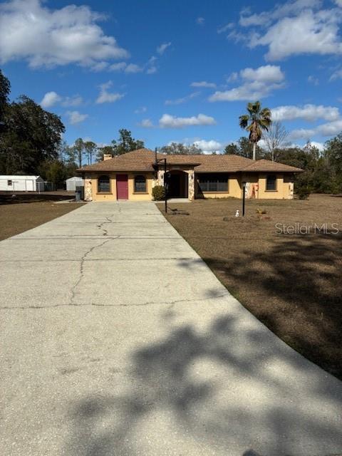 Meticulously maintained 4-bedroom home situated on 2.97 private acres with no HOA or dues. The garage has been converted into a spacious game room with plenty of room for a pool table, or it could serve as a great home office or workspace for a business. This property offers peace of mind with major updates already completed, including a new roof (3/2016), drain field (2017, pumped 2024), new Trane A/C system and ductwork (2/2025), and a new well pump (1/2026). Additional features include a Generac generator, tankless water heater, and a cozy wood-burning stove. The property also includes two sheds and a dog pen. Enjoy comfortable country living with modern upgrades and dependable systems already in place.