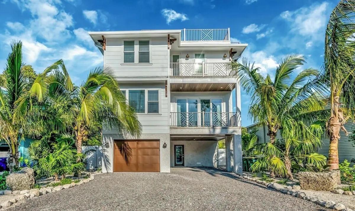Experience the ultimate coastal lifestyle in this exquisite, newly constructed 7-bedroom house located just steps from the pristine white- sands of Anna Maria Island. Designed as a premier short-term vacation rental, allowing nightly rentals, this incredible home offers a turn-key opportunity for savvy investors looking to capitalize on one of Florida’s most lucrative markets.
Boasting seven spacious bedrooms and seven-and-a-half baths, this luxurious retreat is engineered for high-occupancy success and grand entertaining. The open-concept, chef-inspired kitchen—a must-have for large groups—features top-tier appliances, custom cabinetry, and a massive island perfect for guest gatherings.
This home has expansive rooftop deck, offering a rare "best of both worlds" perspective with panoramic 360-degree views. Guests can soak in the vibrant turquoise waters and world-class sunsets over the Gulf of Mexico to the west, then turn to watch the sunrise or passing boats across the sparkling Sarasota Bay to the east.
This property is perfectly positioned to accommodate the high-demand large group segment. The layout is enhanced by proven five-star amenities, including a private heated pool and spa, multiple covered balconies, and high-end designer finishes throughout.
Situated just moments from the beach and the free island trolley, this home ensures a seamless experience for guests seeking a car-free vacation. Outside, your private oasis awaits with a custom-designed pool area that acts as a central hub for relaxation, making it a true showstopper in the competitive rental market. Whether you are looking for a personal tropical escape or a high-performing income generator, this property delivers on every front.