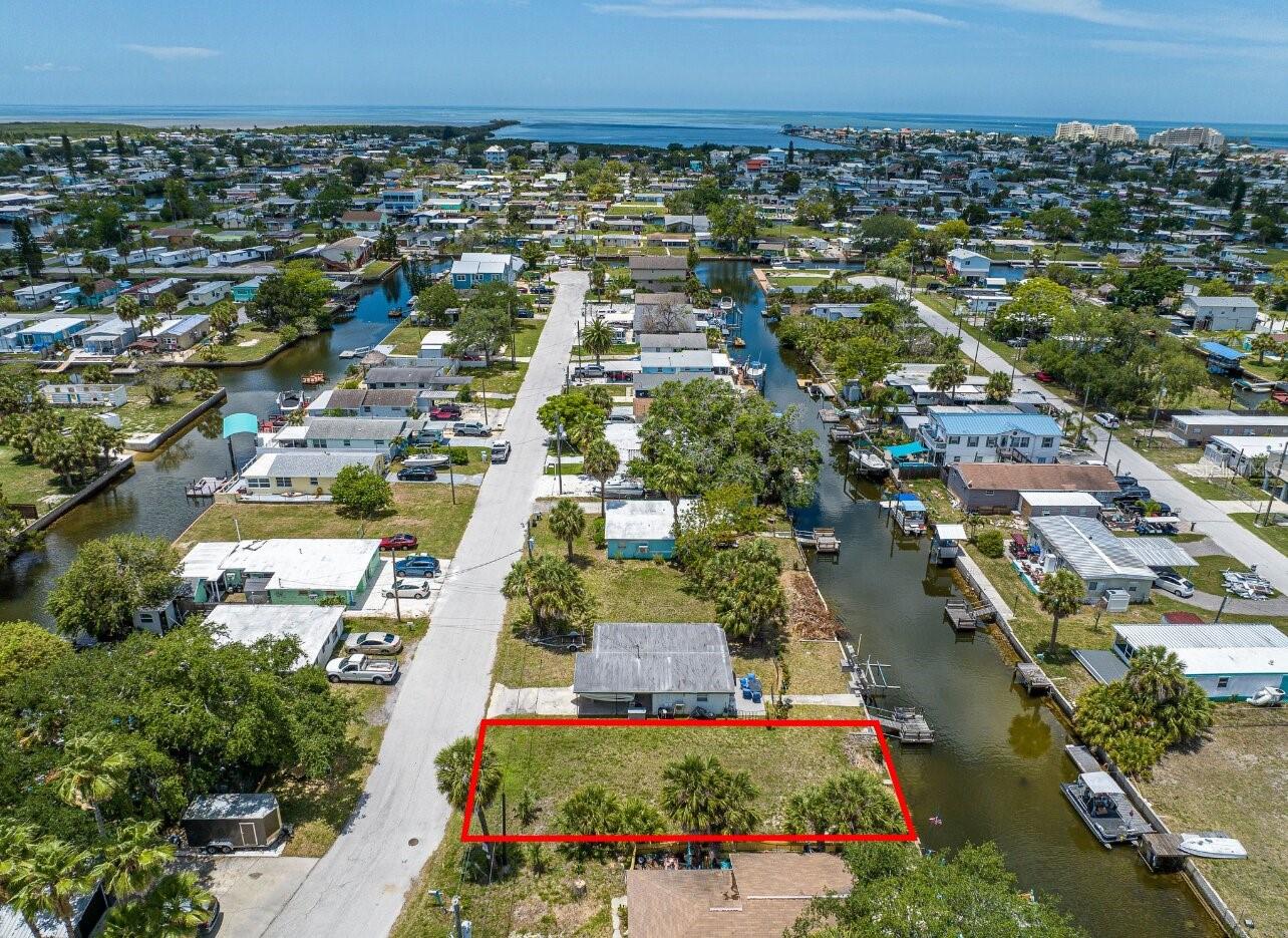 Build Your Waterfront Dream on Direct Gulf Access!
Imagine creating your dream coastal retreat on this exceptional cleared waterfront lot in the highly desirable Vista Del Mar community of Hudson Beach. Offering approximately 4,000 square feet, this prime homesite features a 42' seawall and is perfectly positioned on a protected saltwater canal with direct, unobstructed access to the Gulf of Mexico—no bridges, just smooth sailing to open water, breathtaking sunsets, and endless adventures.
Boating enthusiasts, anglers, and nature lovers will appreciate the ultimate waterfront lifestyle, with opportunities for kayaking, paddleboarding, and fishing right from your backyard. Enjoy serene canal views while watching dolphins, manatees, and seabirds pass by in their natural habitat.
Zoned RMH with mobile homes allowed, this versatile property provides the flexibility to build your ideal getaway or full-time residence with no HOA or deed restrictions to limit your vision. Located in Flood Zone AE, the property offers a higher elevation compared to V zones, adding an extra level of confidence.
Convenience meets coastal charm with easy access to Pelican Marina just up the canal, plus local favorites like Sam’s Beach Bar, waterfront dining, tiki bars, and marinas nearby. Everyday essentials, including grocery stores, shopping, and top-rated medical facilities, are all just minutes away. With US 19 close by, you're approximately an hour to Tampa International Airport and within reach of world-famous attractions like Disney and Universal.
Whether you're envisioning a custom dock, boat lift, or a peaceful waterfront escape, this property is the perfect canvas to bring your dream to life. Experience the laid-back Gulf Coast lifestyle, stunning views, and unmatched access to the water—your slice of paradise starts here.