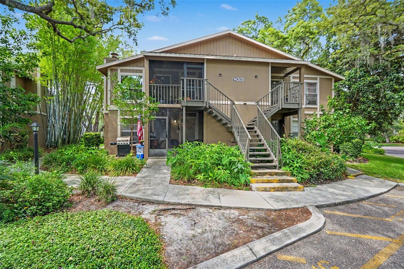 Welcome to this charming 2-bedroom, 2-bath first-floor condo offering comfort, convenience, and low-maintenance living. The open-concept layout features a spacious living and dining area, a well-appointed kitchen with ample cabinetry, and a split-bedroom floor plan for added privacy. The primary suite includes a walk-in closet and en-suite bath, while the screened lanai provides the perfect space to relax and enjoy the peaceful surroundings. Located in a gated community with amenities including a swimming pool, tennis courts, clubhouse, and beautifully maintained grounds. Ideally situated near USF, Moffitt Cancer Center, AdventHealth, I-275, shopping, dining, and entertainment, this home is perfect as a primary residence, seasonal retreat, or investment opportunity.