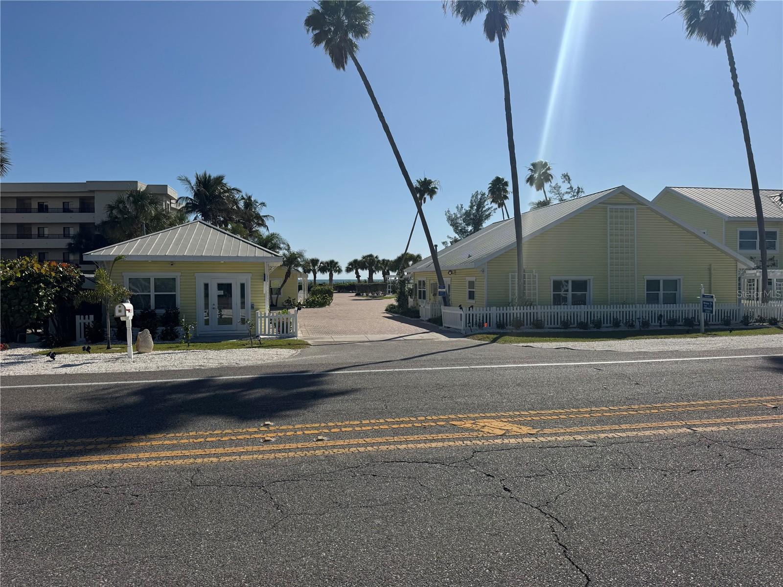 Sought after slice of beachfront paradise on the exclusive island of Longboat Key. Rarely available 2 acre property with 200 feet of beach frontage on the Gulf of America. Currently it hosts a quaint inn featuring ten suites and one cottage, all had been renovated with timeless old Florida decor. The property is surrounded by tropical blooms , lush foliage, vine covered arbors, swaying palm trees, a private gazebo, and a heated swimming pool. Amazing opportunity for a new development, or alternatively a chance to easily bring the property back to its recent glory. The property has been approved to build two single family homes or a six unit luxury Condominium. This fantastic location is near the growing number of top restaurants and attractions . Walk to Harry's Euphemia Haye, Lazy Lobster, new local favorite Lo' Key or stroll over to the bay at Durante Park. All this is just a short drive to the renowned shopping, dining and cultural attractions of St Armands Circle, as wells Downtown Sarasota and Anna Maria Island. So many possibilities for this location, location , location !