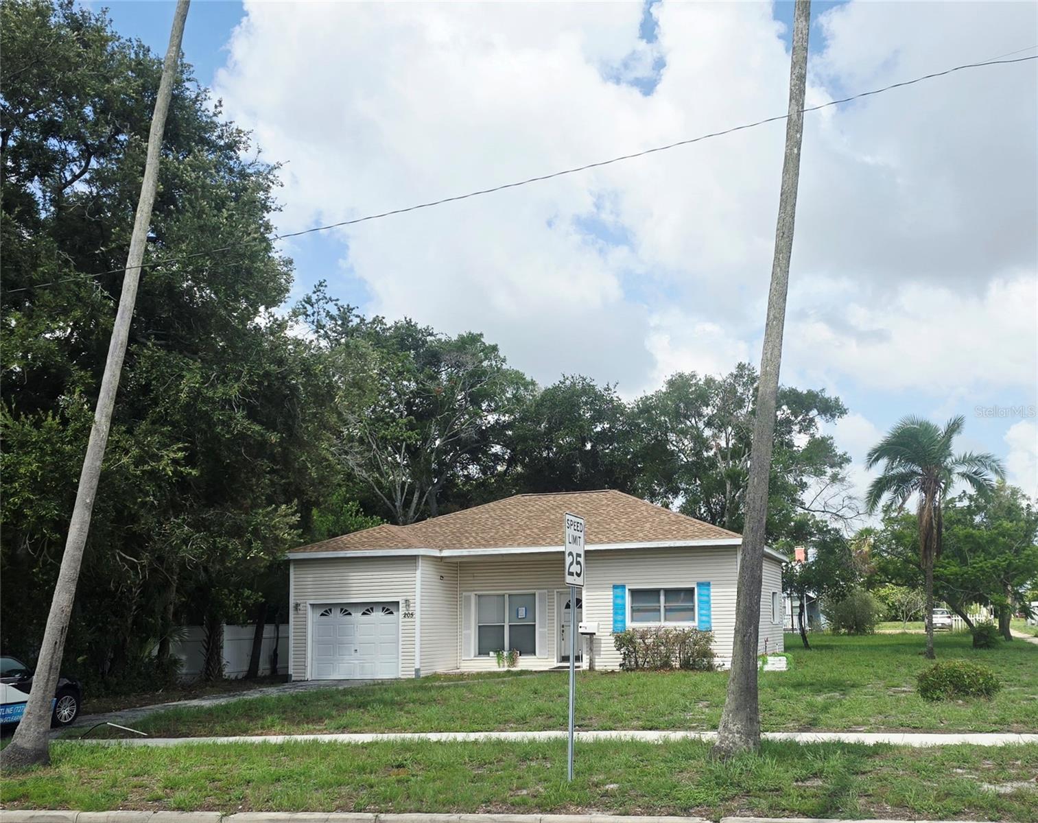 Great Home in sought after County Club Addition also known as "The Presidential Area". This subdivision is absolutely wonderful, friendly, and shows lots of pride of ownership! This home is 2 large bedrooms, 2 full baths (both baths with large privacy windows), plus a large den/office with high ceiling that could be 3rd bedroom. Home sits on a double lot with plenty of room for an addition or a separate guest house (ADU). Sellers has architect's plans for an addition to the house and can convey those with the sale. Inside laundry room and spacious attached garage. New last month: new roof and new water heater. Home does needs cosmetic work and has been priced accordingly. Wonderfully located near downtown Clearwater, the home provides convenient access to local restaurants, parks (including the new 86 mil dollars waterfront park and concert venue), and cultural attractions, while the world-famous white sands of Clearwater Beach are just a short drive away.