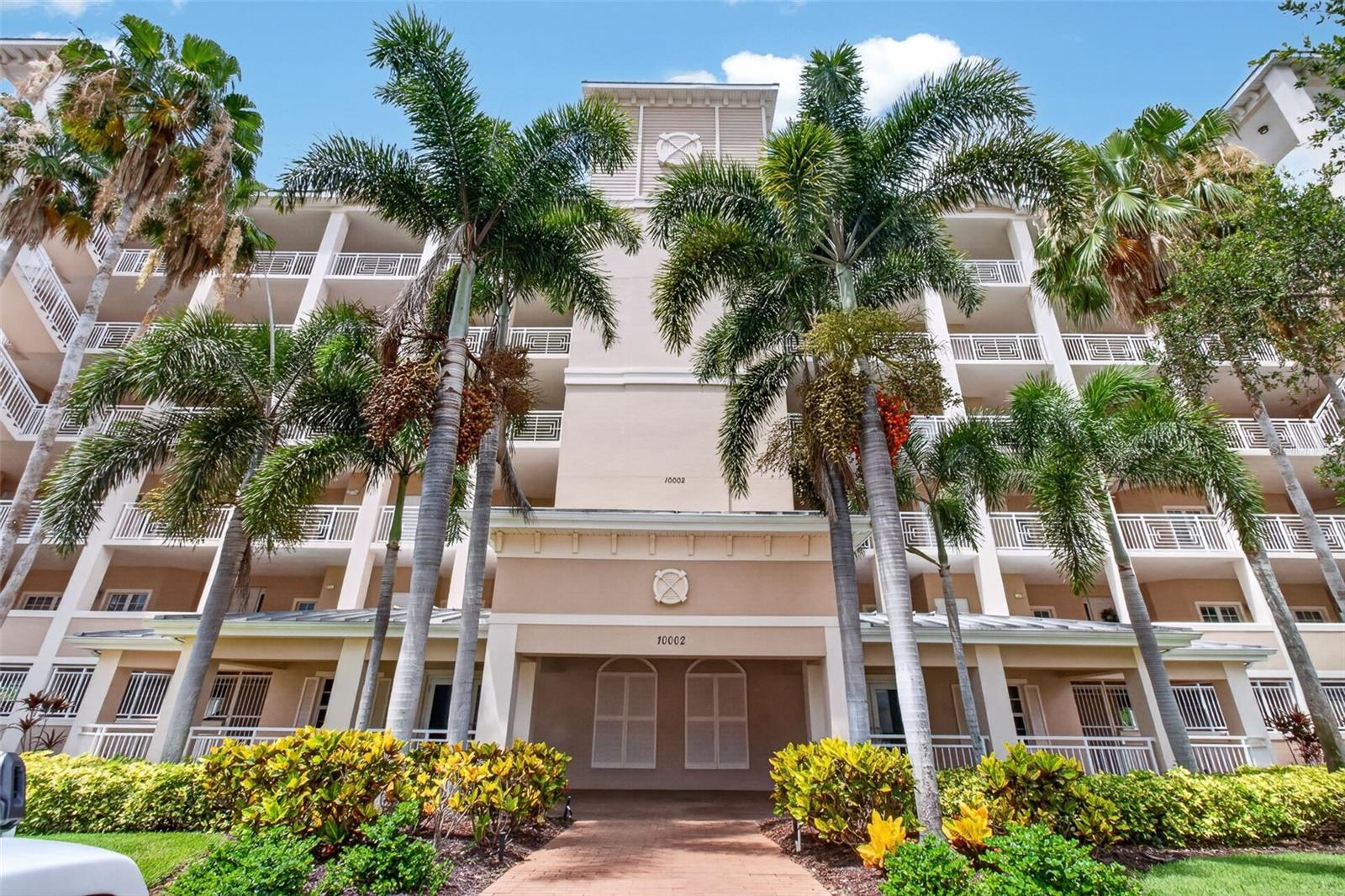 Welcome to one of the most exceptional residences in Seminole Isle — a rare, highly upgraded unit offering breathtaking water views, unmatched outdoor living, and a level of comfort and quality that sets it far above the rest.

Positioned in one of the community’s most desirable locations, this home captures sweeping views of the water where dolphins play and sunsets explode with endless color. What truly sets this unit apart is its rare combination of a beautiful screened-in patio plus an extended open balcony — a feature found in only two units per building. This is outdoor living at its finest, offering the perfect place to relax, entertain, or simply soak in the natural beauty that surrounds you.

A Bright, Open, Immaculate Interior
Step inside and feel the immediate “wow” factor. The layout is open, spacious, and filled with natural light. Brand-new, contiguous porcelain tile flooring flows throughout the home, creating a clean, modern, and cohesive feel from room to room. This is truly one of the cleanest, most move-in-ready units you will tour.

Interior Features & Updates
This home has been meticulously cared for and thoughtfully upgraded with high-quality improvements throughout:

Wood-grain porcelain tile installed in all three bedrooms (12/20/2016)

Trane air-conditioning and heating system, including new rooftop unit and handler — permitted and inspected (8/7/2021)

Water heater replacement (12/16/2021)

Custom window treatments installed throughout the entire unit (12/8/2022)

Entire unit ceiling professionally repainted (11/11/2024)

Contiguous porcelain tile flooring installed throughout the home for a seamless, modern look (11/19/2024)

New baseboards throughout the unit (11/19/2024)

Entire unit and all bedrooms freshly repainted in Benjamin Moore Pale Oak (4/1/2025)

BathMasters complete primary bathroom reconstruction — fully permitted and inspected

Project began 2/11/2025 and completed 3/28/2025

All-new vanities, countertops, mirrors, and lighting

New electrical wiring, plumbing, and piping

Schluter waterproofing system installed behind shower and tub areas for superior moisture protection

The primary bedroom offers peaceful water views and direct access to the screened-in patio. The second bedroom and den are generously sized, providing flexibility for guests, office space, or hobbies.
Also, new roof was installed in 2024 on the building.

A Community That Feels Like a Resort
Seminole Isle is one of Pinellas County’s premier gated communities, known for its solid block construction, strong financials, and beautifully maintained grounds. Residents enjoy:

A luxury pool area that rivals high-end resorts — heated for year-round enjoyment

A well-equipped fitness center

Multiple walking paths that wind throughout the community

Proximity to beaches, shopping, dining, and entertainment

This unit includes an assigned under-building parking space, and being on the second floor means quick access to both the stairs and the elevator.

A Rare Opportunity
Homes like this — with this location, these views, and this level of updating — rarely come to market. Whether you’re seeking a primary residence or a second home, this condo offers a peaceful, tropical retreat wrapped in modern comfort and surrounded by natural beauty.

Make the move to Seminole Isle, and you won’t look back — you’ll simply look out at the water and know you’ve found something truly special.