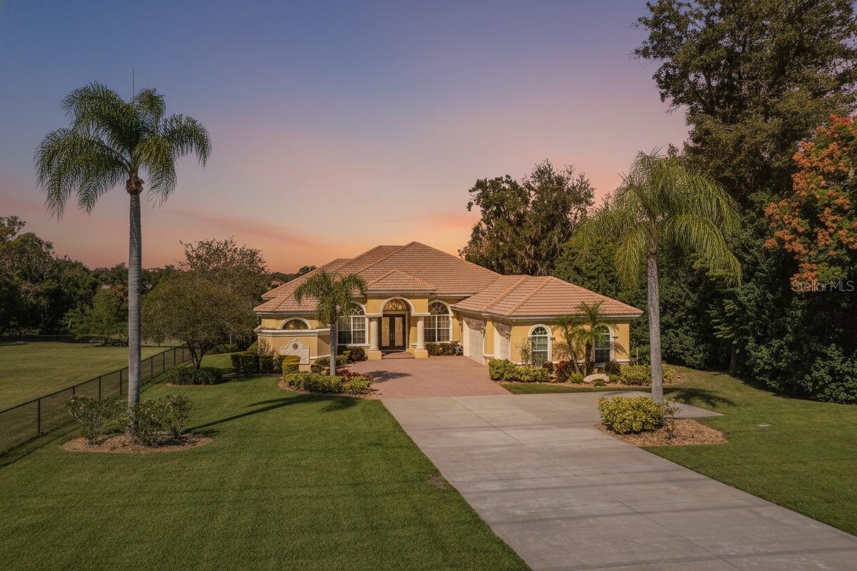 This is where Luxury meets lifestyle this Custom Built Tapia Home was awarded Parade winner with 3 bedrooms, 3-baths plus  a Bonus Room and office, where you can instantly imagine your life unfolding in solace, elegance, and tranquility. From the soaring tray ceilings to the seamless flow of its thoughtfully designed layout, every detail is a testament to upscale living. No HOA. The heart of the home invites both relaxation and entertaining, with a separate Family room and living room and beautiful granite countertops, gas appliances, and a walk-in pantry in a kitchen built to inspire. It also has, walk-in closets, over-sized walk in master shower onlooking a beautiful fountain garden area. Walk through to the expansive screened patio and picture evenings spent by the pool and hot tub, overlooking the large backyard and the view of beautiful conservation. This home features beautiful paver finishes patio/pool deck. Extra features include a tankless hot water heater, whole-home backup generator, gas washer and dryer convey with the home and a central home vacuum system. Built by renowned Tapia Homes, it’s a place designed for great entertaining while living a luxury lifestyle. All sizes approximate buyer to verify. Seller is a licensed real estate broker.