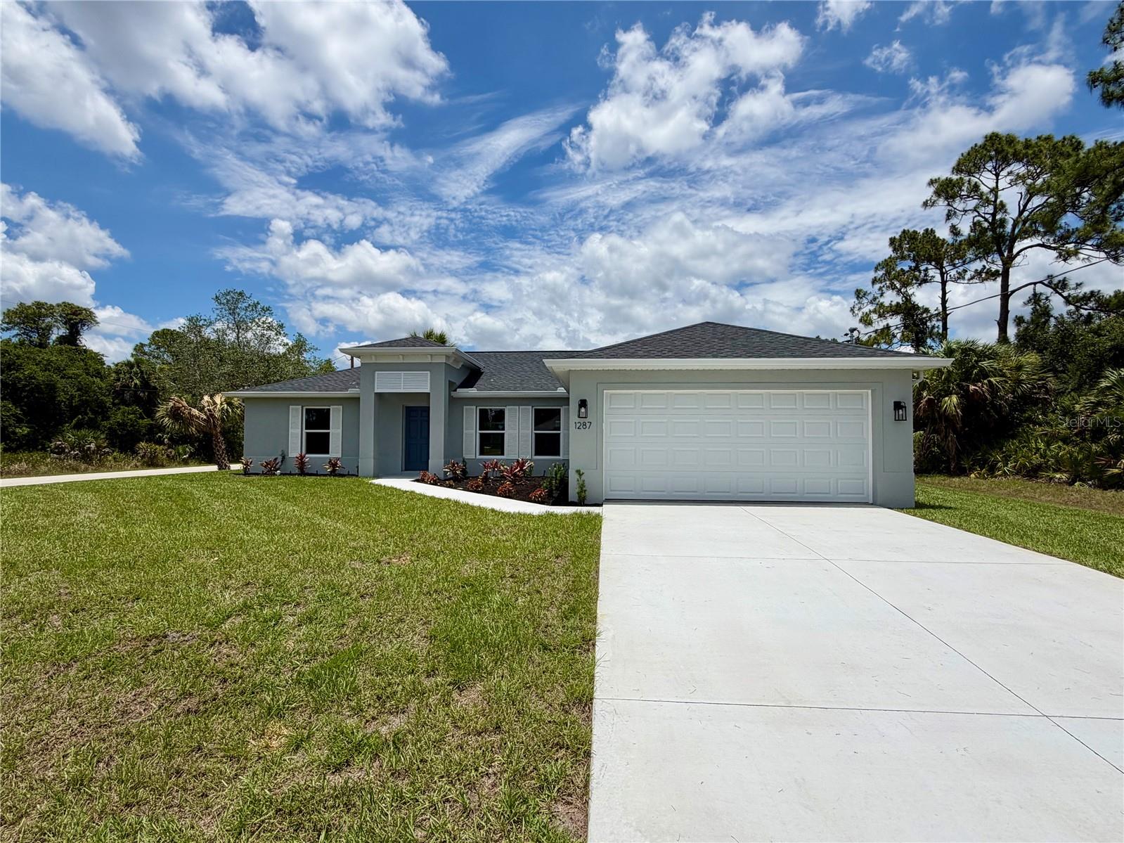 COMING SOON! BEAUTIFUL NEW CONSTRUCTION HOME!

Why settle for a basic "builder grade" home when you can have it all included? This stunning home offers a level of upgrades rarely seen at this price point. Featuring an open, split floor plan with vaulted ceilings, this home is built for both style and long-term savings.

PREMIUM FEATURES INCLUDED: This home is fully equipped with PGT double-pane Hurricane Impact windows and sliding doors, meaning NO shutters are ever needed. You will find 50-year-rated porcelain tile flooring throughout the entire home, including the showers. The chef-inspired kitchen features 36-inch upper cabinets with soft-close drawers and doors, premium granite or quartz countertops, and quality stainless steel appliances.

BUILT FOR SAVINGS AND DURABILITY: Designed to keep your insurance, maintenance, and utility costs at a minimum, this home includes an energy-efficient HVAC system, a 3- or 4-zone sprinkler system and a 30-year shingle roof. The exterior comes fully sodded and professionally landscaped, complete with gutters around the entire perimeter and a fully screened-in lanai for year-round Florida living.

PEACE OF MIND: Move in with confidence knowing your investment is protected by extensive warranties, including a 10-year structural warranty and a 10-year HVAC warranty.

FINANCING BONUS: Our preferred lender is currently offering up to $1,500 in closing cost assistance!