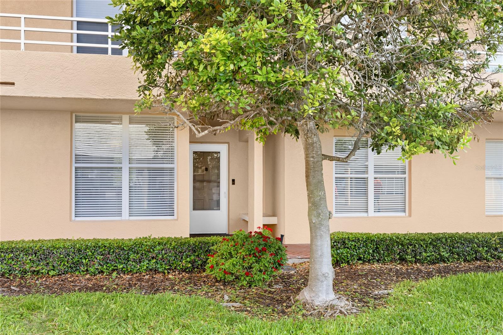 Virtually Staged. Front-row seats to Florida living. Welcome to The Greens at Pinebrook, where peaceful fairway and water views set the backdrop for this completely renovated first-floor condominium in the desirable Ironwood Golf Community. Whether you're an avid golfer or simply enjoy wide-open green space, you'll appreciate the community's pay-as-you-play golf course with no mandatory membership fees.

From the moment you step inside, you'll notice the difference. Thoughtfully redesigned from top to bottom, this 2-bedroom, 2-bath residence combines modern finishes with effortless comfort. Freshly textured walls, updated flooring, contemporary lighting, new blinds, and beautifully renovated bathrooms create a clean, sophisticated feel throughout.

The heart of the home is the stylish kitchen featuring granite countertops, brand-new appliances, abundant cabinetry, and generous pantry storage. The open layout flows seamlessly into the living and dining spaces, creating an inviting setting for entertaining guests or enjoying a quiet evening at home.

One of the home's standout features is the enclosed lanai, where you'll enjoy sweeping golf course and pond views just beyond your door. With no stairs, elevators, or long walks to navigate, this first-floor location offers easy access and a connection to the beautiful outdoor surroundings that make Florida living so appealing.

The spacious primary suite serves as a private retreat with a custom-organized walk-in closet and an updated ensuite bath designed with both style and functionality in mind.

Pinebrook residents enjoy resort-style amenities including two pools, a spa, fitness center, clubhouse, billiards room, library, ping pong, grilling area, and beautifully maintained grounds. The association fee covers internet, cable, water, sewer, trash, pest control, exterior maintenance, insurance, reserves, and recreational facilities, allowing for a truly low-maintenance lifestyle.

Conveniently located near GT Bray Park, shopping, restaurants, medical facilities, downtown Bradenton, the Riverwalk, and just minutes from the sugar-sand beaches of Anna Maria Island, this move-in-ready home offers the perfect blend of location, lifestyle, and value.

Renovated, move-in ready, and perfectly positioned to enjoy the view—this is the Florida lifestyle you've been waiting for.