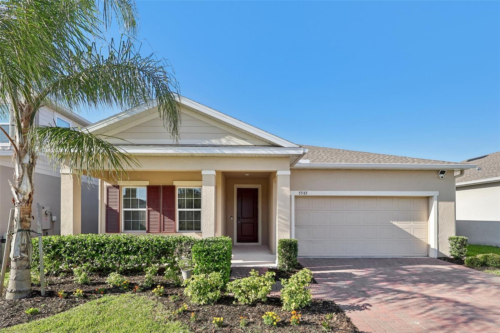 Virtually Staged. *Offering interest rate buy down or closing cost credit through preferred lender!* *Qualified for Rent to Own* 

Welcome to this beautifully upgraded 4-bedroom, 3-bathroom home located in the highly sought-after Siena Reserve community of St. Cloud. Situated on a premium lake-view homesite, this move-in-ready residence offers the perfect blend of comfort, functionality, and modern living.

The spacious open-concept floor plan features generous living and dining areas, along with a beautifully appointed kitchen showcasing white cabinetry, quartz countertops, a double oven package, and ample cabinet and counter space for everyday living and entertaining. The primary suite offers a walk-in closet and private bath, while three additional bedrooms and two full bathrooms provide flexibility for family, guests, or a home office.

Step outside and enjoy the relaxing covered patio overlooking the water, creating the perfect setting for morning coffee, evening sunsets, or entertaining guests. The home has been thoughtfully enhanced with numerous upgrades, including a covered front porch package, motorized screened lanai with additional screen enclosure, upgraded LED lighting and ceiling fans throughout, custom blinds and trim package, water softener and reverse osmosis system, Tesla EV charger, Ring security system, gutters, and more. High-speed fiber internet availability adds even more convenience for today's connected lifestyle.

Residents of Siena Reserve enjoy excellent community amenities, including a community pool, playground, dog park, and walking areas, creating an ideal environment for families, pet owners, and those who enjoy an active lifestyle.

Ideally located just minutes from Lake Nona, Medical City, Orlando International Airport, major highways, shopping, dining, and entertainment, this location offers convenient access to everything Central Florida has to offer.

Whether you're looking for your primary residence or your next investment opportunity, this exceptional home is one you won't want to miss. Schedule your private showing today.