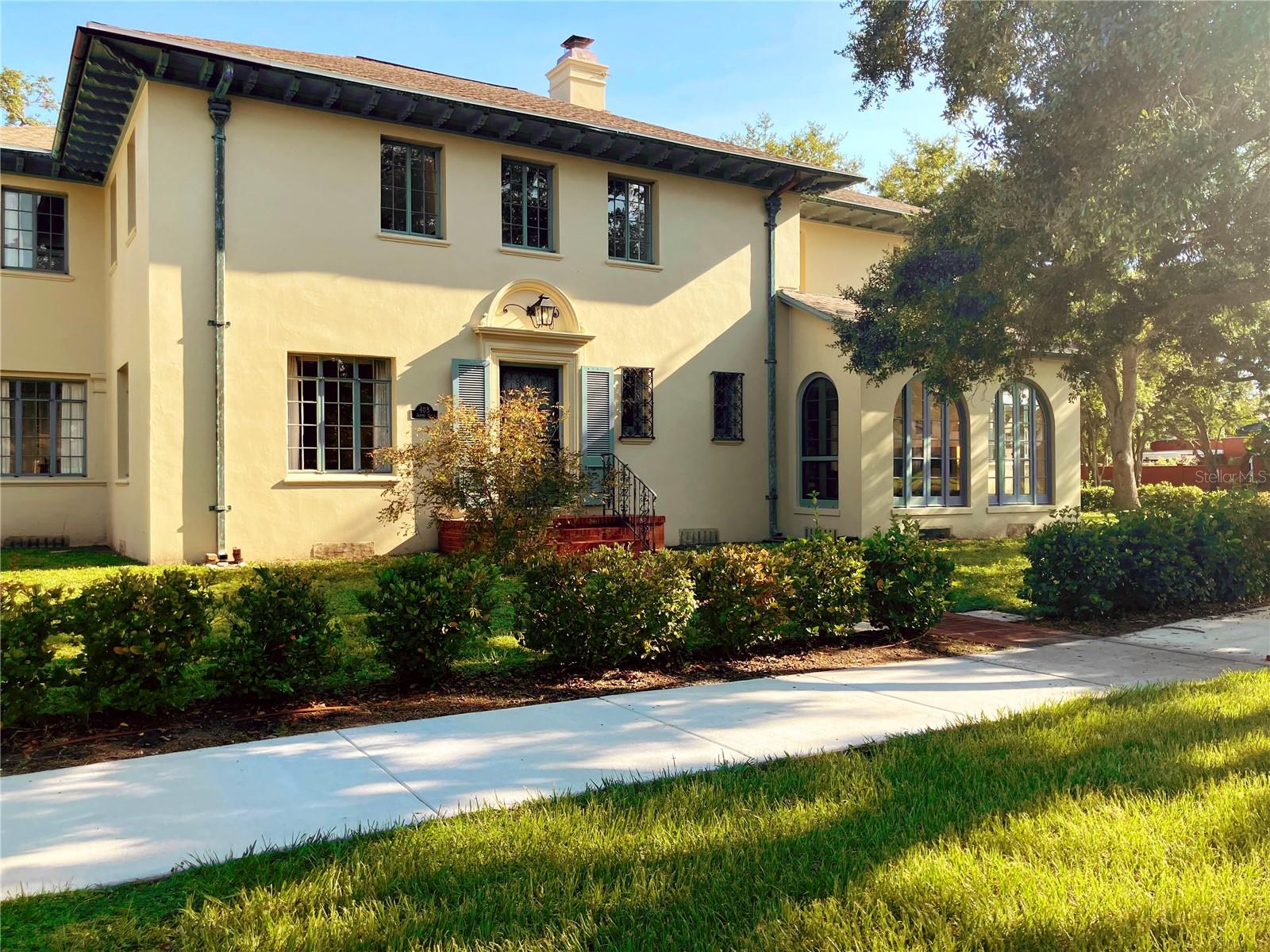 Tucked along one of the most coveted streets in **Historic Harbor Oaks, Clearwater’s first developed neighborhood**, this 1925 Spanish Mediterranean Revival blends old-world character with thoughtfully updated modern living. Surrounded by mature oaks, the home feels like a private European retreat just minutes from the water.

Inside, natural light pours through five sunrooms that wrap the residence, creating warm, inviting living spaces throughout. A grand staircase welcomes you into the main level featuring a gracious living room with wood-burning fireplace, a cozy library nook, formal dining room, breakfast room, and an elegant kitchen with AGA dual-fuel range, Fisher & Paykel appliances, British Shaws of Darwen ceramic sinks and a butler’s pantry with wine refrigeration. Upstairs are three spacious bedrooms, each with en-suite baths, including a serene primary suite with its own private sunroom overlooking the oak canopy.

A coral garden path leads to the detached 1-bedroom, 1-bath carriage house with kitchenette, ideal for guests, a private office, or creative studio, installed with separate wifi.


Extensive renovations done over three years restore the home’s historic integrity while upgrading every major system. Improvements include new electrical and plumbing (2023), new exterior sewer line (2026), new roof (2019), new Trane split HVAC system with separate temperature control for each level (2023), a 26kW Generac whole-house generator, and a custom whole-house water filtration system designed to remove chemicals and microplastics. Architectural woodwork and copper downspouts were restored, and interiors feature custom Plain English cabinetry built in London, restored heart-pine floors, and handmade terracotta tiles imported from Siena, Italy.

Outside, lush landscaping, new sod, and full irrigation. No HOA. Flood Zone X. Located just a short stroll from the Harbor Oaks pier for sunset views and minutes from Clearwater Beach, the Pinellas Trail, and Coachman Park with BayCare Sound. Renderings of the pool and wellness room are digitally created to illustrate the potential vision and design possibilities for these spaces.

Historic charm. European soul. Completely turnkey for modern living.