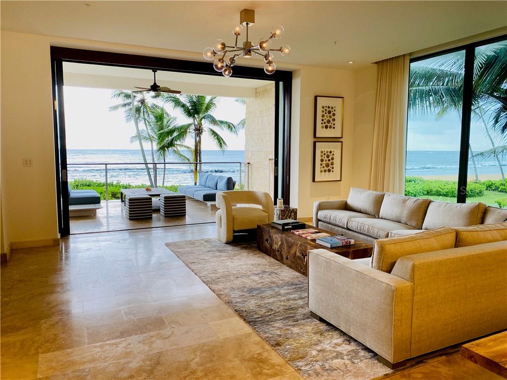 Walk from the privacy of your residence directly to the beach.  Enjoy breathtaking ocean views from your bedroom and living room. Watch daily beautiful sunsets from your private terrace.   

Welcome to West Beach #3522/23, a Dorado Beach Ritz-Carlton Reserve Beachfront Residence. Indulge in the luxury lifestyle that this renowned world class resort offers. As a homeowner you enjoy all of the resort’s amenities with exclusive concierge service and a la carte services. 

Residence features 3 bedrooms, 3.5 bathrooms with 2 outdoor showers and a media room.  Property has 3,056 interior square feet and a total of 4,085 square feet including the 2 terraces and 2 golf cart parking spaces. 

This extraordinary ocean-front residence is being sold as is, fully furnished (artwork excluded) and it comes with 2 golf carts.  

Make this your dream home today!