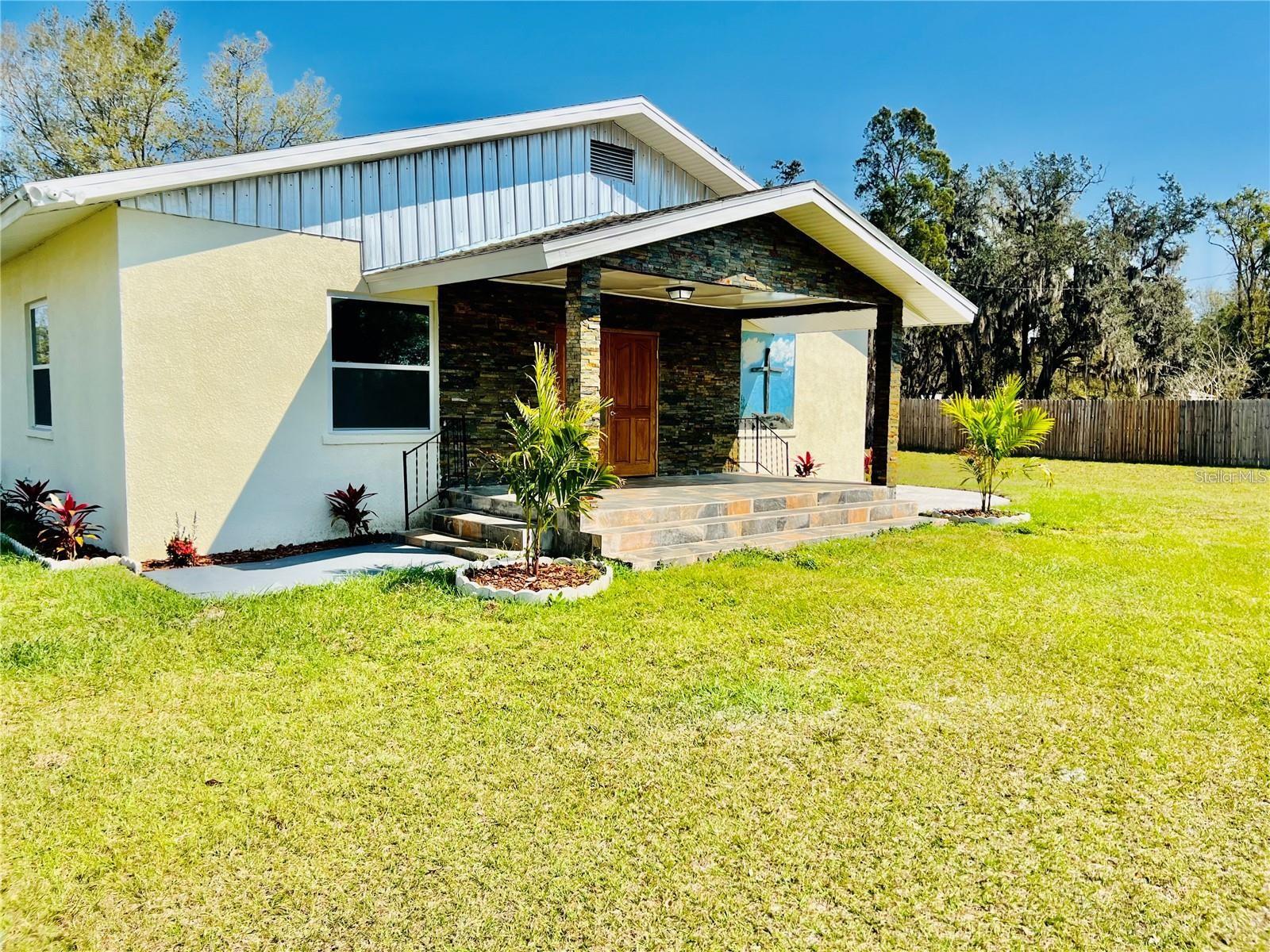In Bartow, Florida's 4000 square foot, fully remodeled RELIGIOUS FACILITY. There is a 2500 square feet sanctuary, two conference rooms, an office, a kitchen, and four restrooms in this facility. This Facility includes a 1700 square foot manufactured home with three bedrooms and two baths. This property has a security system, is completely fenced, and is gated. located on a dead-end street off of Highway 60, close to the intersection of Alturas Road and Old Lake Wales Road. Good access points to Lake Wales, Bartow, Winter Haven, and other locations. Seller will consider owner financing with 30-50% down