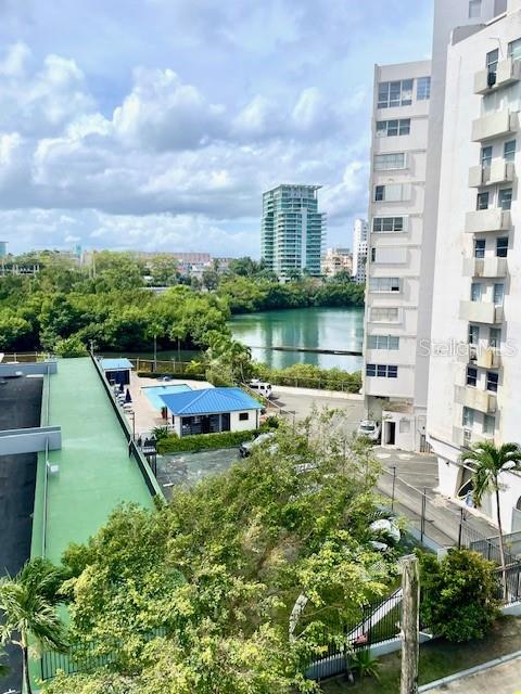Excellent Investment. Very high potential for short term and vacations rental income and /or enjoy living in a very exclusive neighborhood.  Location in the heart of Condado. Beautiful view to the Condado Lagoon from the living area.  Corner apartment  with excellent cross ventilation. Only two apartments in each floor. Includes living , dining , kitchen, 3 bedrooms and 2 bathrooms and one covered gated parking space .
Located  3  to 5 minutes walking  distance to the main hotels in the area such as La Concha Hotel, Vanderbilt Hotel and among other places like  Ventana al Mar , restaurants, stores, beach and lagoon.