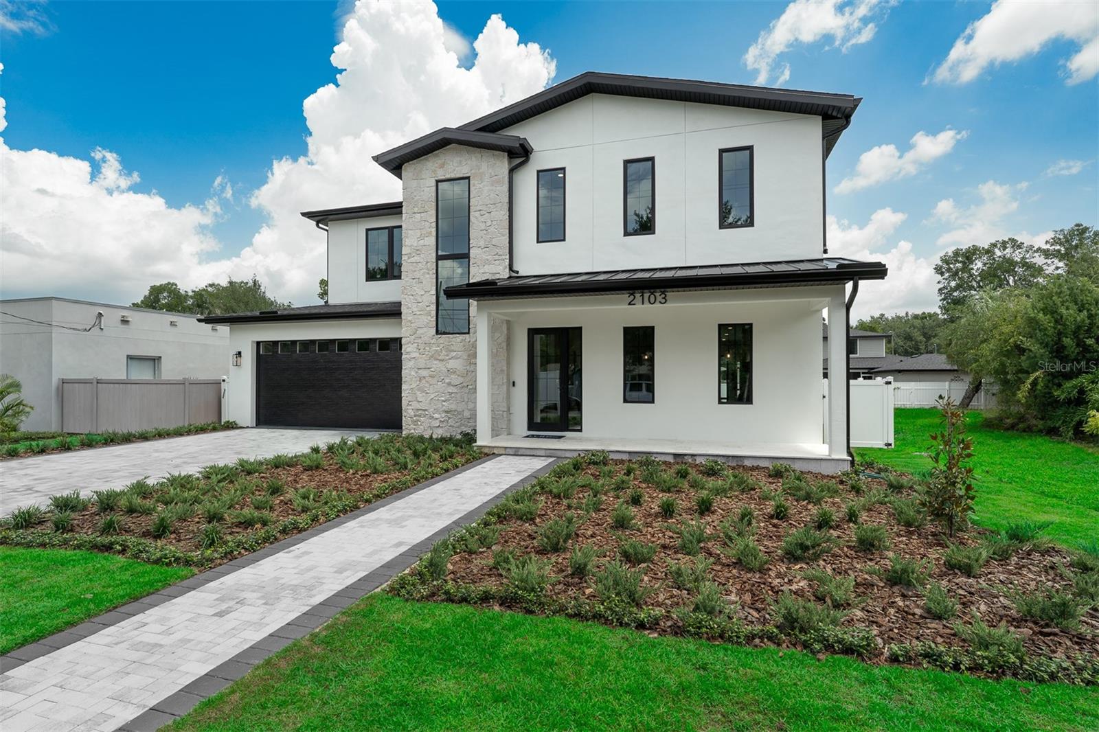 New construction!!!  Exquisite brand-new 5 Bedrooms | 4.5 Bathrooms | Loft | 3,495 Sq Ft luxury residence by LUIH Luxury Homes, ideally located in the heart of Colonialtown North. This thoughtfully designed home offers 5 bedrooms, 4.5 bathrooms, and a spacious loft, blending refined elegance with modern functionality—perfect for both everyday living and upscale entertaining. The first-floor primary suite provides a private retreat with spa-inspired finishes, while a dedicated home office offers flexibility for work or study. Upstairs, you’ll find four generously sized bedrooms, a large loft area, and a conveniently located laundry room designed to simplify daily routines. At the heart of the home is a chef’s gourmet kitchen, featuring a 36” gas cooktop, double ovens, wine bar, oversized island, abundant cabinetry, and premium appliances—ideal for hosting gatherings or enjoying family meals. The open-concept living and dining areas are bathed in natural light and enhanced by high ceilings and designer finishes throughout. Step outside to your private resort-style oasis, complete with a sparkling pool, covered patio, and fully equipped outdoor kitchen, creating the perfect setting to enjoy Florida living year-round. Additional highlights include an attached garage and professionally designed landscaping that complements the home’s modern architecture. Just minutes from Audubon Park, the Mills 50 District, Downtown Orlando, and Winter Park, this exceptional property offers the perfect combination of luxury, lifestyle, and location—a true dream home in one of Orlando’s most desirable neighborhoods!