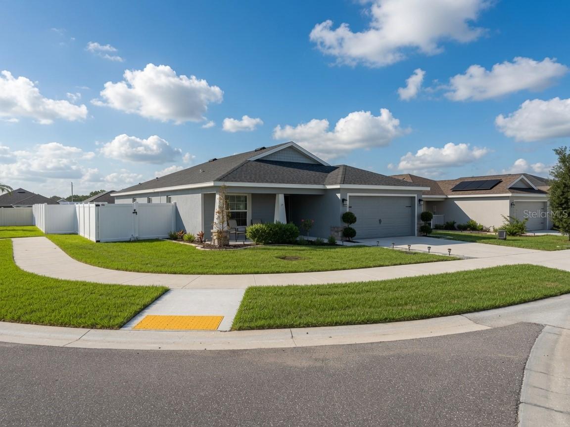 Welcome to your new home! Priced to sell with motivated sellers, this home resides on a highly desirable corner lot with a fully fenced yard and distanced from neighboring homes providing rare privacy for the area. Built in 2020, this well-maintained property features a 4 Bedroom, 2 Full-Bath plan with elevated ceilings in the open floor plan Living, Dining, and Kitchen areas providing a spacious feel. The Kitchen was fully remodeled in late 2025 adding new hardwood cabinets with soft-close drawers, quartz countertops, a three-foot undermount sink, and under-cabinet lighting. Unlike other homes in the area, 8-inch Luxury Vinyl Flooring was installed in 2025 with oversized baseboards throughout the home giving you a really unique place to call home. The large backyard also features a 12'x12' storage shed. Home water filtration system and recently replaced irrigation system (2026) are just some of the upgrades that set this home apart. Situated just off of US HWY 27 and US HWY 17-92 provides quick access to restaurants, grocery, retail, theme parks (Disney, Universal, Lego Land, Sea Word, Bok Tower, and more in a rapidly expanding area. Community pool, park, and soccer field are in close proximity. Move-in ready and a place you can be proud to call home!