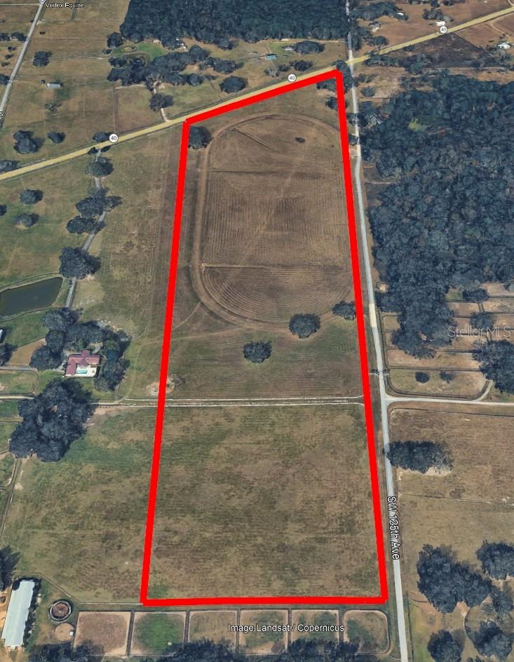 REDUCED PRICE- This 67-acre parcel, just 3.5 miles from the World Equestrian Center on Highway 40 West, offers improved pasture with excellent soil, existing drainage, a historic racetrack, and majestic oak trees. Priced to sell, this rare offering combines premium location and equestrian potential—an exceptional opportunity near Ocala’s top venue. Offering consists of approximately 67 acres to be divided from a larger 157 acres tract parent parcel.  Closing subject to survey, legal description, and approval by Marion County New parcel identification number to be assigned after closing.