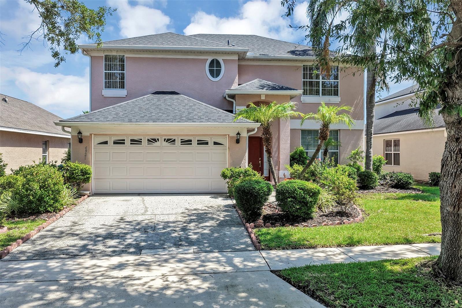 Enjoy the splendor of Hunter's Creek and their massive park, playground and recreation amenities! Original owners, lovingly maintained! (2019) Roof, (2021) and a (2024) Water heater! Air conditioning System First level has ceramic tile throughout!  Updated Stainless Steel appliances including Refrigerator, dishwasher, range and microwave! Awesome layout featuring formal living rooms, formal dining room, nice size family room and a large open kitchen including a nice size eat-in area! All bedrooms are on 2nd level, ideally designed for a growing family.  Large fenced in backyard including a covered porch and well landscaped, featuring fruit trees and privacy!  Ideal family gathering design. Take advantage of the 21st rated community in the United States by CNN Money Magazine! Community amenities include but no limited to Spacious parks, playgrounds and tot lots, walking trails, basketball courts, pickleball courts, tennis courts, baseball fields, soccer fields, sought after schools, organized community activities and much much more! Ideally located to theme parks, International Airport, beaches, downtown Orlando to name a few.  This opportunity will not disappoint!  Tremendous value and opportunity awaits new owners!