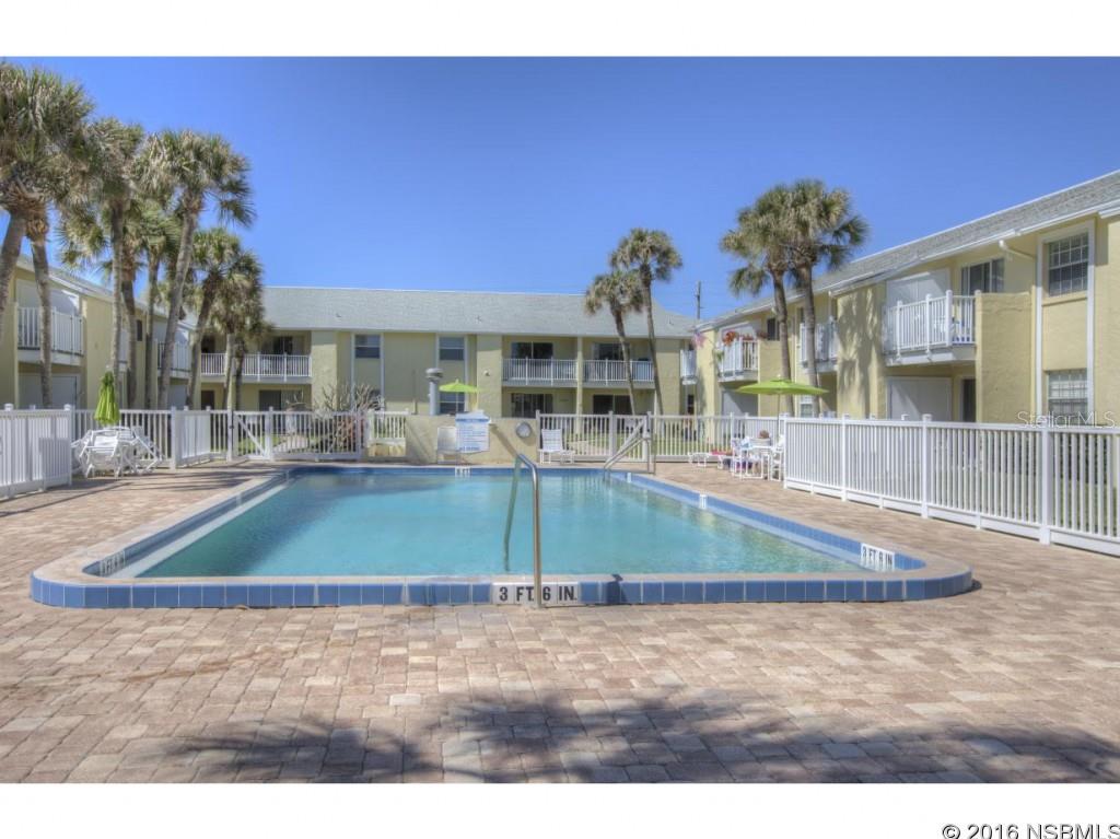 COMPLETELY REMODELED. ADORABLE 1 BEDROOM WITH GREAT VIEWS OF THE ATLANTIC OCEAN.    PERFECT GETAWAY AND VACATION HOME.    BRIGHT AND CHEERY WITH BEACH RETREAT COASTAL FURNITURE, WAINSCOTING, GORGEOUS TOUCHES AND ACCENTS THRU-OUT.  RECENT UPDATES INCLUDE BUT NOT LIMITED TO:          AC unit replaced summer 2015Â·         Washer and dryer are less than 4 years oldÂ·         Carpet is less than 2 years oldÂ·         All appliances in the kitchen are less than 5 years oldÂ·         Slider is new and all windows are newÂ·         Bathroom has been updated Colony Beach Club offers 2 full-sized pools (one HEATED), direct access to the beach, 2 BBQ areas and one covered parking space. There is extra storage for beach chairs, etc plus a large storage closet in the condo! Close to shopping, Flagler and the BEACH!  CALL TODAY AND LIVE THE NSB LIFESTYLE NOW! ;LocationDescription: Condo ;Water: City