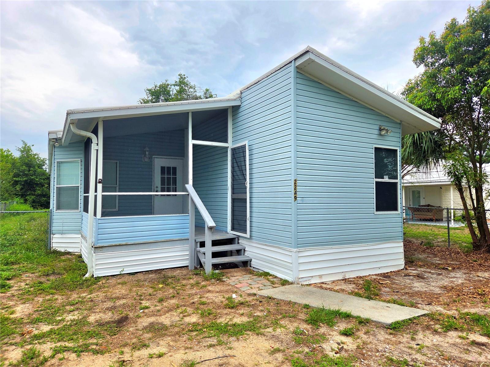 Turnkey multi-unit investment with $2,800+ monthly income—two homes on one lot in a prime Lakeland location.

Welcome to 2249 & 2253 Golfview Street, a rare income-producing property in Lakeland featuring two separate residences on one spacious, fully fenced lot. This is an ideal opportunity for investors seeking strong cash flow, long-term tenant stability, and a prime Central Florida location.

The first residence at 2249 Golfview Street is a well-maintained 3-bedroom, 2-bath mobile home offering approximately 1,224 square feet of living space, complete with updated flooring throughout. The second residence at 2253 Golfview Street is a 3-bedroom, 1-bath wood frame home with approximately 858 square feet, along with an additional outbuilding that provides excellent potential for storage, workshop use, or flex space.

Both units are currently tenant-occupied with long-term renters in place, providing immediate and consistent rental income. Combined rental income is approximately $2,830 per month, making this property well-suited for investors utilizing DSCR (Debt Service Coverage Ratio) financing or those looking to expand their rental portfolio with a stabilized, income-generating asset. The dual-residence layout offers diversified income streams and helps reduce vacancy risk.

The large fenced-in lot adds significant value, offering privacy, flexibility, and functional outdoor space for tenants. With two separate homes on one parcel, this property presents a unique opportunity for multi-unit investment in one of Central Florida’s fastest-growing areas.

Ideally located in Lakeland, this property offers convenient access to I-4, making commuting to Tampa and Orlando seamless. It is just minutes from downtown Lakeland, Lakeland Linder International Airport, shopping, dining, medical facilities, and local colleges including Florida Southern College and Southeastern University.

Whether you are searching for a Lakeland investment property, duplex-style rental, multi-unit income property, or a high-performing addition to your Central Florida real estate portfolio, this opportunity delivers immediate cash flow with long-term upside potential.