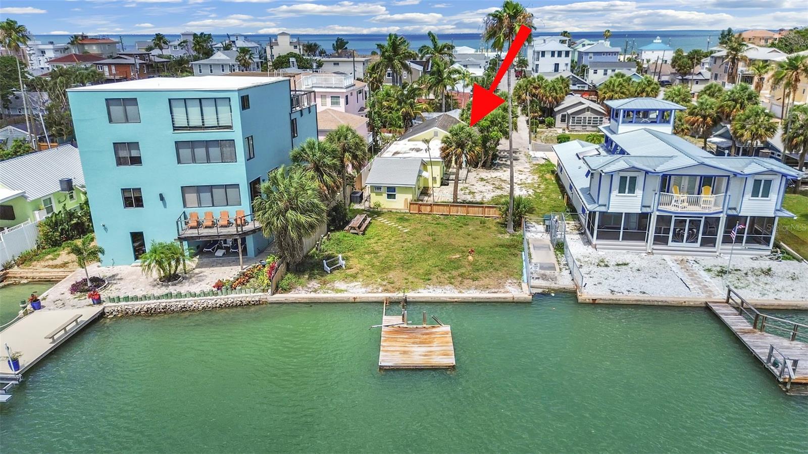 Exceptional redevelopment opportunity in the heart of Sunset Beach. Located directly on the Intracoastal Waterway, this flood-damaged triplex offers incredible potential for investors, builders, or buyers looking to create a custom waterfront property in one of Treasure Island’s most sought-after coastal communities. Situated at 201 90th Ave, this property features stunning water views, a private waterfront setting, and direct access with no bridges to the Gulf. The existing triplex sustained flood damage and is being sold as-is. Whether you choose to renovate, or redevelop, the value is in the prime waterfront location and oversized opportunity this property presents. Just a short walk to Sunset Beach, local restaurants, live entertainment, and beach bars, this is a rare chance to secure Intracoastal frontage in a highly desirable area surrounded by luxury waterfront homes and vibrant beach culture. Buyer to verify all zoning, rebuilding, FEMA, and permitting requirements with the City of Treasure Island. Cash offers preferred. May be sold as package deal with 130 90th Ave