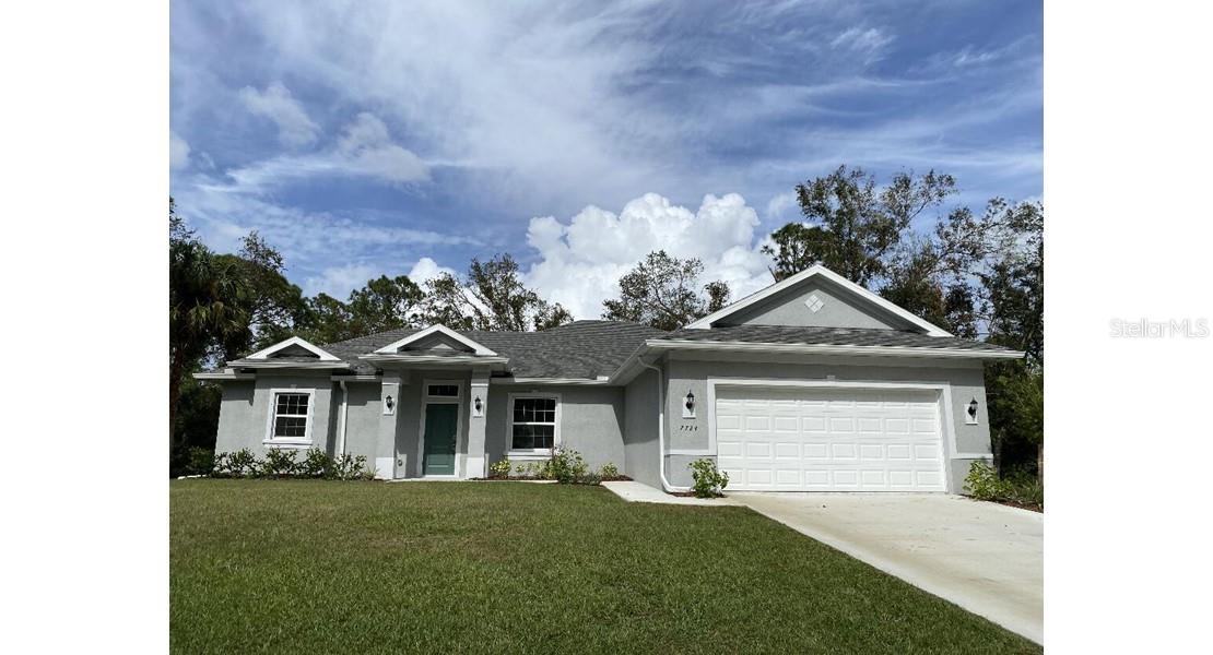 MOVE IN READ!!!  NEW CONSTRUCTION !!!  This 4 bedroom home has spacious rooms with an open/split floor plan.  Kitchen has Granite countertops with breakfast bar, which compliments the kitchen.  Great room is in combination with kitchen as an open concept.  There are sliding glass doors from the Great Room which leads to a covered porch.  The split Bedroom plan has a Primary bedroom which features a walk in closet, walk in shower, double sinks with a garden tub.  3 other bedrooms with central hallway.  The home has a separate laundry room with counter top and cabinet space situated between the kitchen and 2 car garage.
