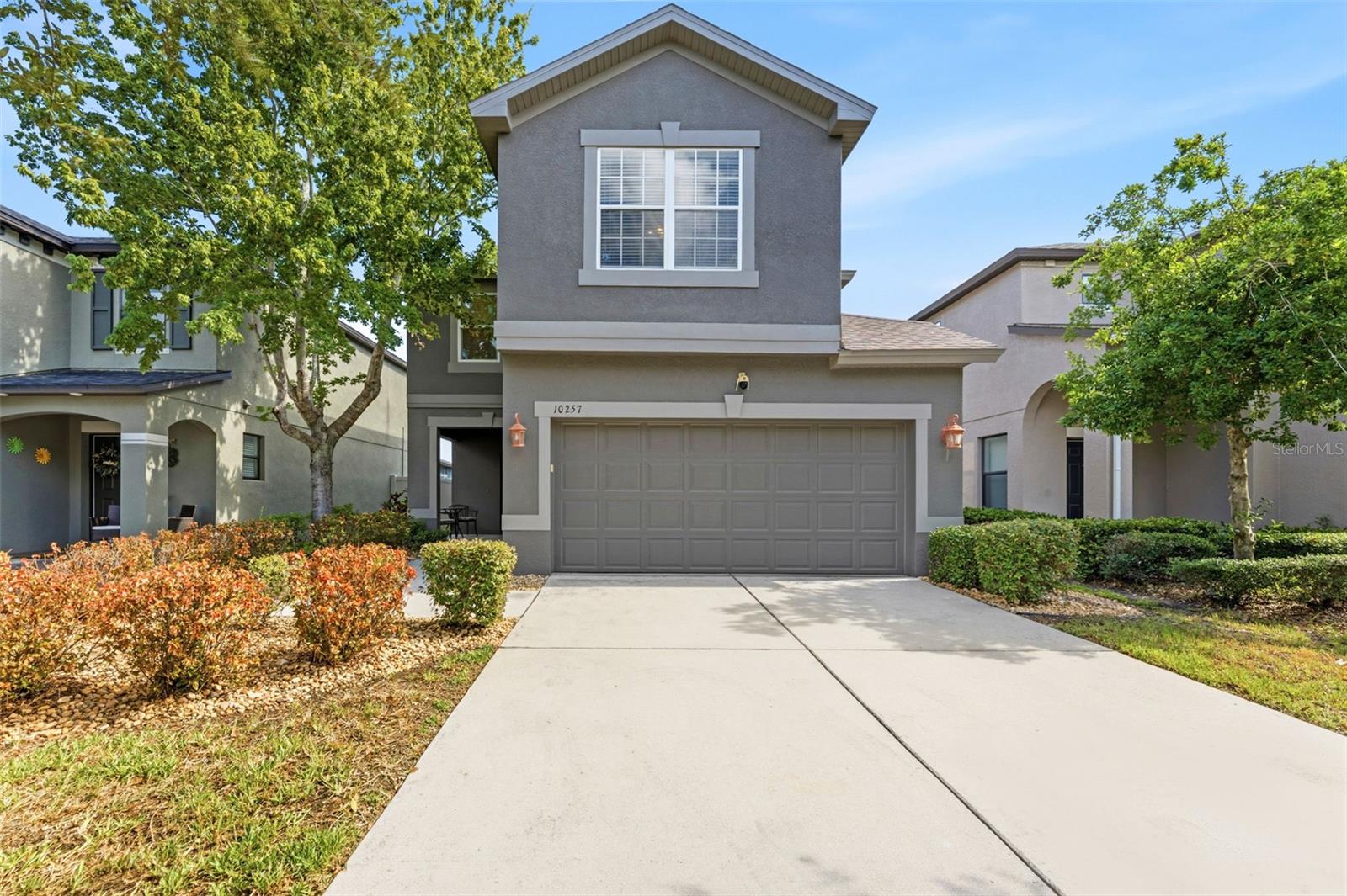 Freshly updated in Belmont with a NEW ROOF (2025), EXTERIOR PAINT (2025), LUXURY VINYL PLANK FLOORING (2025), CARPETS (2025), BASEBOARDS (2025), and WATER HEATER (2023), so you can move in and simply enjoy this 3-bedroom, 2.5-bath home with 2,084-square-foot layout. High ceilings open up the main level, while an upstairs loft flexes as a home office, playroom, or media space. The primary ensuite delivers true retreat status: dual vanities, a large soaking tub, separate walk-in shower, private toilet, and a large walk-in closet. The secondary full bath was recently remodeled (2025) with a new vanity, lighting, tile flooring, and window. Out back, a full-perimeter vinyl fence wraps the open space that has endless possibilities to create your own private Florida living space.The location seals the deal. Belmont residents enjoy resort-style amenities without the resort fees: a zero-entry lagoon-style pool with lap lanes, pickleball and tennis courts, basketball courts, playgrounds, and walking trails, all just minutes from your door.