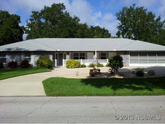 Spacious, immaculate, 3 bedroom, 3 bath residence on huge triple 160 x 125 lot (.46 acre) boasting 2607 sq.ft. under a/c. Many features for comfort and ease. This home is handicapped ready with easy access doorways and shower stalls. The garage is over-sized. Kitchen cabinets feature pull out drawers. Two electric built-in fireplaces. Two light tubes for natural bright light. 160 ft. deep well for irrigation (no noticeable iron rust deposits per owner,) 4 zone irrigation system. More features; Central vac system, reverse osmosis for kitchen water service, two laundry tubs, bathroom heat lamps, garage door screen, surround sound, generator hook-up/wired station, RV+ parking, hot tub, deck area, and large fenced area, hip roof with architectural shingles, immaculate pristine landscaping. The over-sized lot can accommodate a large pool plus an additional structure. A lot of value for price per square foot, condition and features. ;Water: City