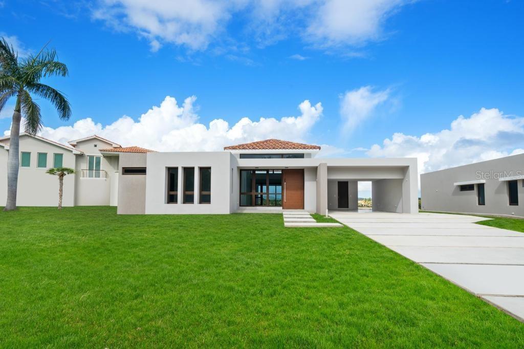 LOS LAGOS AT PALMAS Del Mar Resort is the newest development in Humacao, Puerto Rico, just 50 minutes away from San Juan with 4675 square feet, one level homes. Elegant open concept and a stunning Lake, Golf and El Yunque Rain Forest views. A gem hidden in paradise with the most beautiful sunsets steps away from the golf lake. Palmas Del Mar offers their Palmas Athletic Club membership with Tennis, Golf, Piclkleball and much more. Los Lagos Club House community offers Infinity Pool, Spa, Fitness Center and much more.