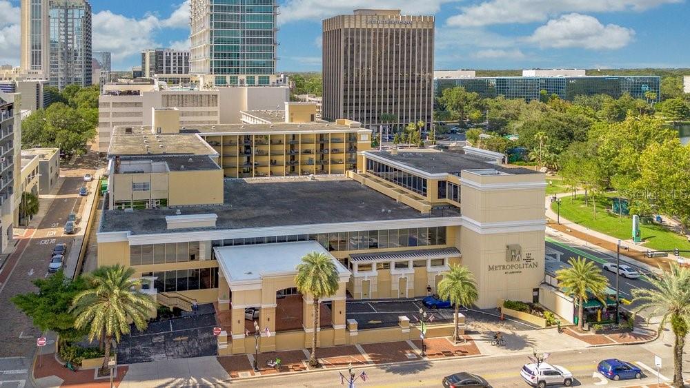 Experience the best of Downtown Orlando living in this beautifully updated 2-bedroom, 2-bath unit offering 1,324 square feet in the beautiful Metropolitan at Lake Eola. Located on the desirable pool level, this residence combines modern upgrades with an unbeatable location just across from Lake Eola Park and the Amphitheater, placing concerts, festivals, dining, shopping, and year-round entertainment just outside your door.
Inside, you'll find a spacious open-concept split floor plan that offers TWO PRIMARY SUITES on separate sides of the unit, a formal space that can be used as either a living room, dining room or home office, a spacious family room off the kitchen, enhanced by new high-end, water-resistant porcelain wood-look tile flooring, fresh interior paint, and exposed industrial-style ceilings that add character and contemporary appeal. The kitchen features granite countertops, stainless steel appliances, and opens seamlessly to the living and dining areas, creating an ideal space for both everyday living and entertaining. Oversized glass doors fill the home with natural light while providing access to the expansive private patio from both the living room and the primary suite. The massive primary bedroom offers an abundance of space, huge closet, and a private retreat you'll love coming home to. An upgraded washer and dryer complete this move-in-ready residence.
This home also offers exceptional conveniences rarely found in downtown living, including TWO oversized assigned parking spaces that can accommodate up to THREE vehicles, plus a private assigned storage unit within the building. Residents of The Metropolitan at Lake Eola enjoy resort-style amenities including a sparkling pool, fitness center, resident club room, front desk service, secured entry, water service, and Wi-Fi in the common areas. This building is immaculately maintained and located in the heart of Downtown Orlando where you'll enjoy effortless access to Lake Eola, Publix, Thornton Park, tons of restaurants, nightlife, entertainment venues, and the city's vibrant business district. Whether you're looking for a full-time residence or an exceptional downtown lifestyle, this move-in-ready condo is one you won't want to miss. Call today for more information and to schedule your private showing!