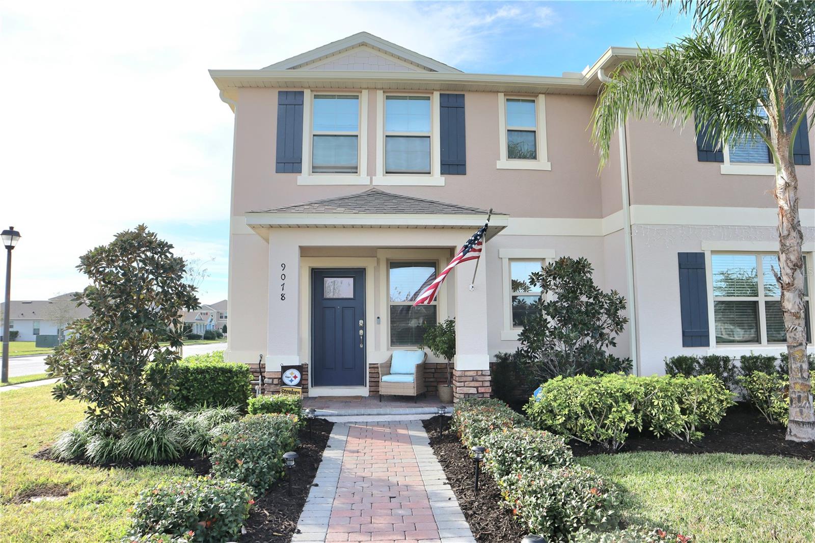 Must see Move-in Ready home!! Impressive Corner Townhome with the largest floor plan located in the highly desired community of Waterleigh. Walk through the front porch and step into an open floor plan designed for modern living. The spacious living room boasts sliding doors that open to reveal a serene view and provide seamless access to the covered screened-in paver patio, perfect for enjoying Florida's beautiful weather year-round. At the heart of the home, the kitchen, is a chef's dream with granite countertops, an oversized kitchen island, and seating for four, ideal for entertaining guests. A convenient closet pantry ensures ample storage space for all your culinary needs. A must-see surprise is a custom built-in bar nestled perfectly underneath the stairs! Retreat to the primary suite, featuring a large bedroom, walk-in closet, and ensuite bathroom for ultimate relaxation and privacy. Upstairs, a versatile loft area offers additional living space, while bedrooms two and three each provide their own unique charms. Bedroom 2 treats you to versatility that can be used for the home office, while Bedroom 3 rivals a secondary primary bedroom with its spacious layout, comfortably accommodating a king-sized bed and large standing desk, perfect for remote work or study. Beyond the luxury of the home itself lies the world class amenities of the Waterleigh community, where resort style living is a way of life. Dive into multiple pools, stay active at the fitness center, tennis courts and volleyball courts. Let the young ones unleash their energy in the playroom and playgrounds. Serene walking trails provide picturesque lake views and connection with nature. Worry-free living is ensured with included lawn care. With Waterleigh's new construction townhomes not being available until 2025, seize the opportunity to make this newer built (2020) home your own!!! Move-in ready and brimming with luxury and convenience, this townhome offers the perfect blend of modern comfort and community charm. Don't miss your chance to experience the finest of Florida living in Waterleigh. Minutes from Disney. Close to Top Rated Schools, Top Restaurants, Area Attractions & Downtown Winter Garden.