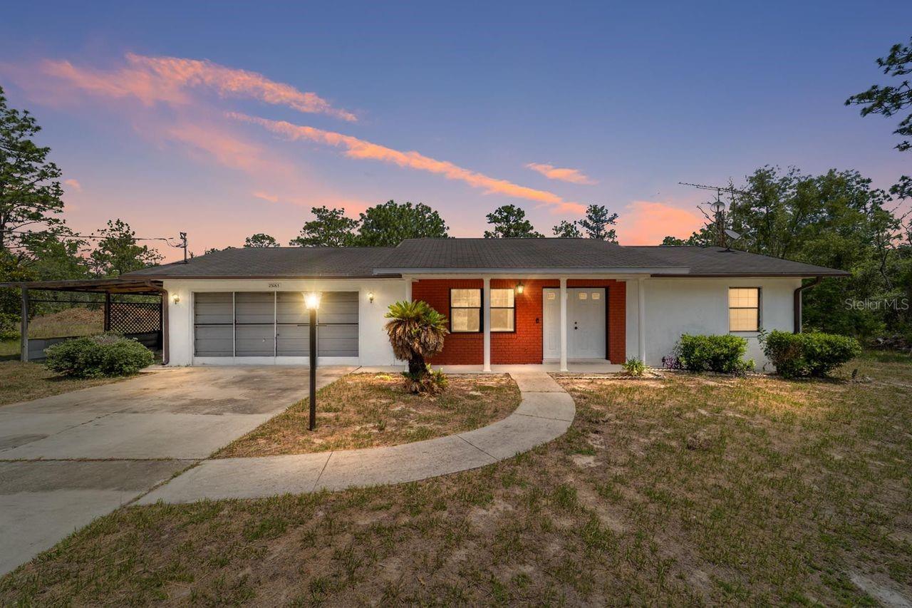 Virtually Staged. Looking for privacy, space, and the true Florida lifestyle? This charming 3-bedroom, 2-bath home sits on
nearly 2 acres in the desirable Rainbow Lakes Estates community of Dunnellon. Built in 1984, the property
features a 2-car garage, an additional 1-car carport, and a spacious covered lanai perfect for enjoying your
morning coffee or relaxing evenings. With plenty of room to create your own outdoor retreat, this home offers
the perfect balance of peaceful country living and convenience. Located just minutes from the crystal-clear
Rainbow River and a short drive to Crystal River and the World Equestrian Center, you'll enjoy easy access to
kayaking, tubing, fishing, dining, shopping, and entertainment. Whether you're searching for a full-time
residence, a vacation getaway, or an investment opportunity, this could be your own slice of Florida paradise.
Schedule your private showing today!