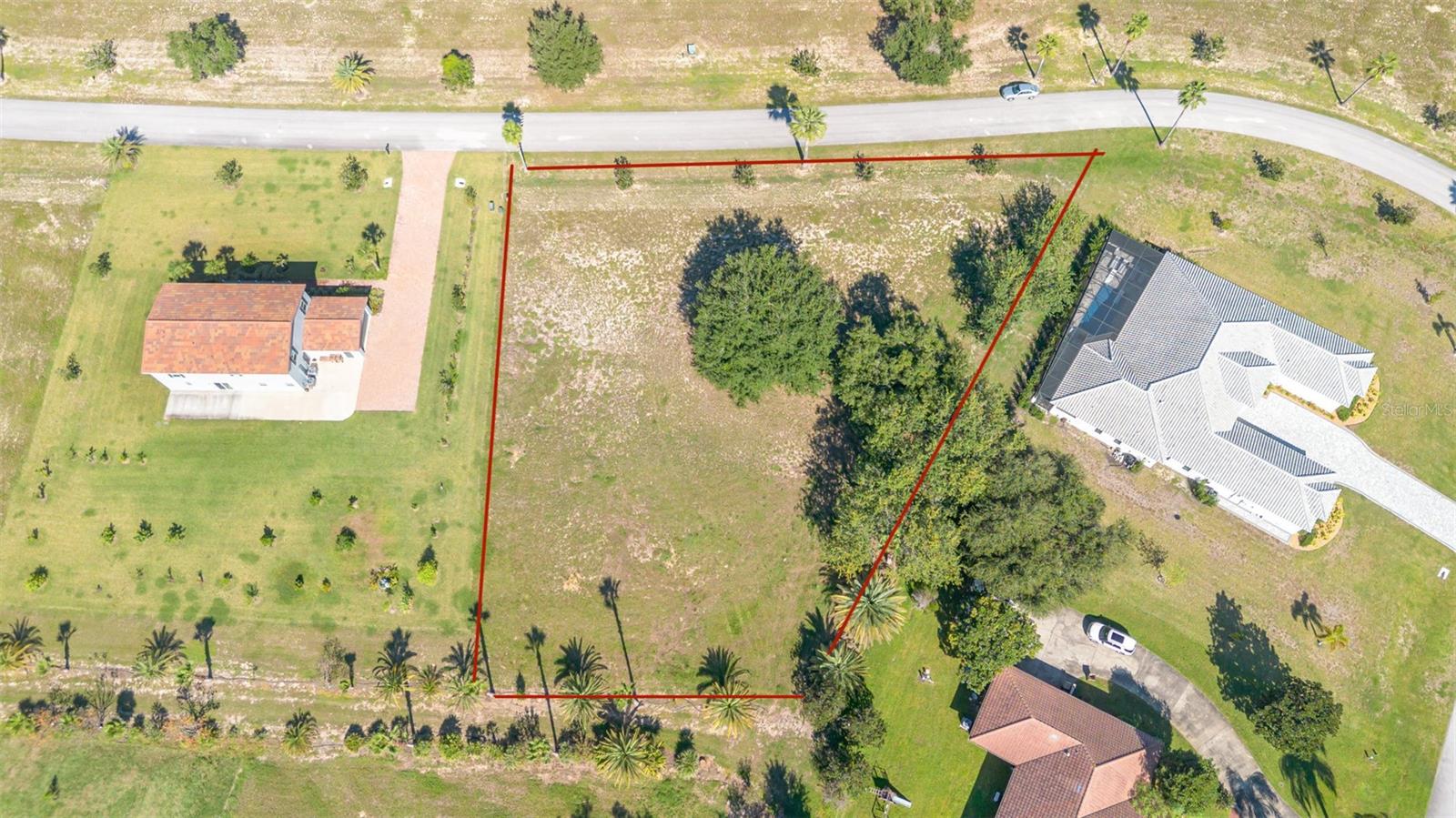 Looking for the perfect spot to build your custom home in Florida.  Discover a remarkable 0.73-acre home site in the exclusive, gated Garden City community of Groveland, Florida. Elevated and picturesque, this parcel presents a rare chance to design and build your dream residence in one of the region’s most desirable neighborhoods. Framed by scenic vistas and surrounded by luxury homes, the lot provides the ideal canvas for a home that reflects your personal vision and lifestyle. Within this private enclave, you’ll enjoy both peace of mind and prestige, as the elegance of nearby residences enhances the property’s exclusivity. The community allows you the freedom to select your own builder, with thoughtful requirements that ensure enduring quality: a minimum of 3,000 square feet of living space, consisting of a tile roof, and the option of a striking two-story design. The essential utilities—including electricity and city water—are already in place, and with the land cleared and maintained, you can move straight into the exciting planning stage of your future home. Though it offers a serene retreat, the location is highly convenient. Easy access to Florida’s Turnpike and Highway 27 keeps you connected to everything Central Florida has for your needs and wants. In short, this is more than just a lot—it’s an invitation to craft a lifestyle of luxury, tranquility, and convenience in a community where natural beauty and modern living blend seamlessly. Survey Available