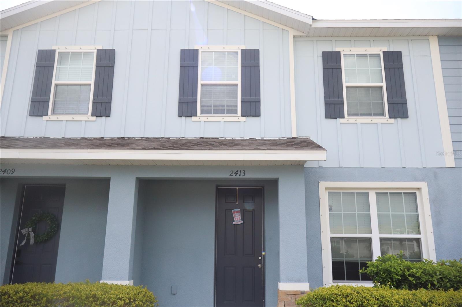 Welcome to 2413 Gathering Way, a beautifully designed townhome in the highly sought-after community of Asteria. Perfectly located just minutes from shopping, restaurants, and everyday conveniences, this private, secluded neighborhood offers the best of both worlds—easy access to everything you need while providing a peaceful place to call home. THIS HOME HAS A BRAND-NEW 2-TON AC. INSTALLED  JUNE 2026. VERY IMPORTANT UPGRADE FROM 1.5 TON

This well-appointed three-bedroom, two-and-a-half-bath townhome features a spacious and functional floor plan designed for modern living. The impressive primary suite includes dual vanities, dual sinks, a large walk-in shower, and generous closet space, creating the perfect retreat at the end of the day.

The open-concept main living area is ideal for entertaining, featuring a spacious great room that flows seamlessly into the kitchen and dining area. Whether you're hosting friends or enjoying a quiet evening at home, the layout offers both comfort and versatility.

Step outside to your private lanai, providing plenty of room for grilling, relaxing, or gathering with family and friends. An attached two-car garage adds convenience and extra storage.

Residents of Asteria enjoy outstanding community amenities, including a resort-style swimming pool, a fully equipped fitness center, and beautifully maintained grounds that create a welcoming atmosphere for families and professionals alike.

Located within an excellent school district and competitively priced, this home presents an outstanding opportunity to enjoy low-maintenance living in one of the area's most desirable communities.

Don't miss your chance to make 2413 Gathering Way your next home!