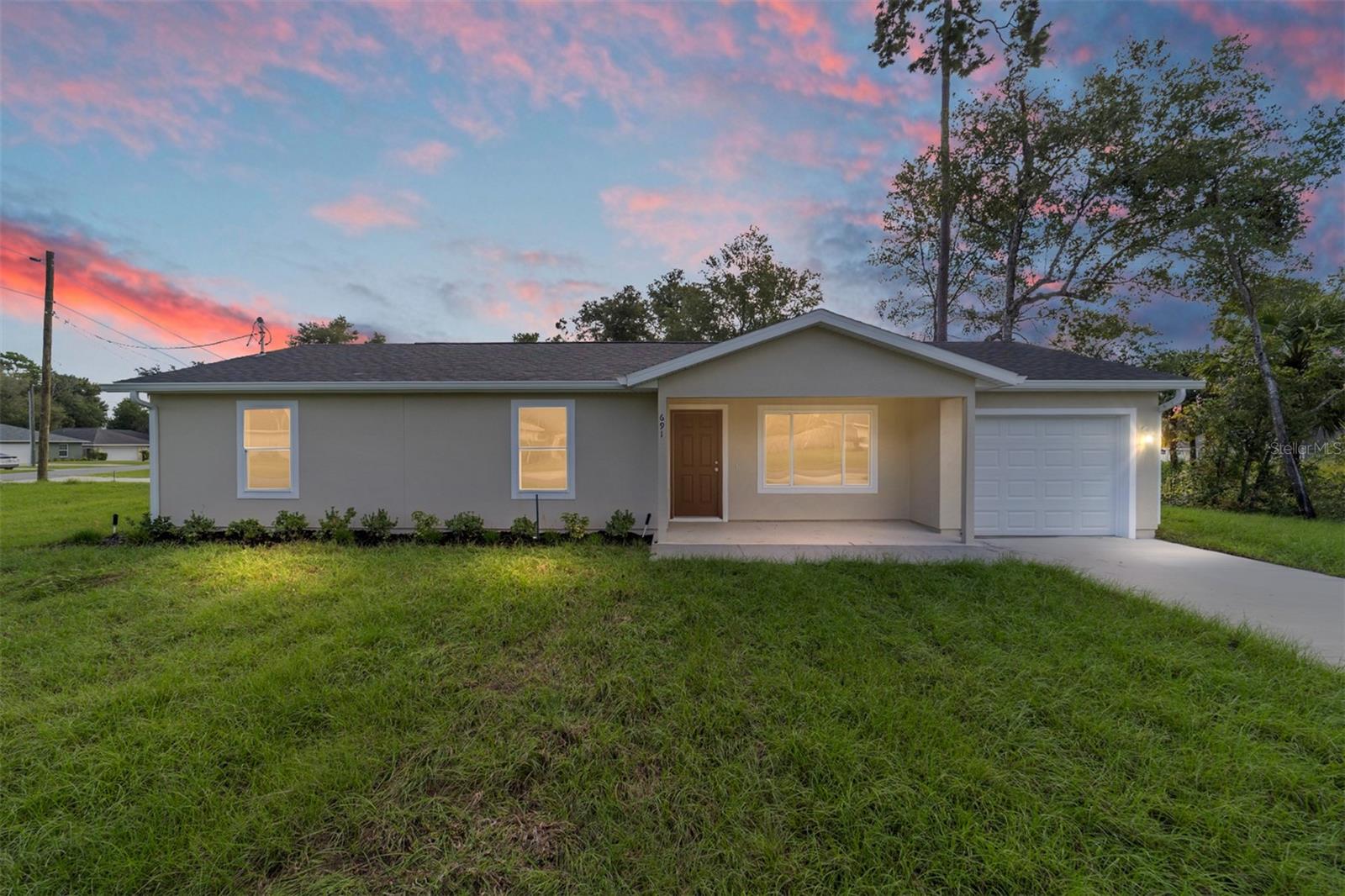 Under Construction. New Construction Home in Rainbow Lakes Estates – Close to World Equestrian Center & Rainbow River
Beautifully crafted 3-bedroom, 2-bathroom BLOCK home, inside has luxury vinyl wood flooring and granite countertops home located in the peaceful community of Rainbow Lakes Estates in Dunnellon, Florida. Just 30 minutes from the World Equestrian Center and 25 minutes from the famous Rainbow River, you’ll enjoy endless opportunities for kayaking, canoeing, tubing, and fishing in crystal-clear waters. Built with quality and attention to detail, this brand-new home offers modern finishes, a functional floor plan, and the comfort of low-maintenance living in a serene setting. Whether you’re an outdoor enthusiast or simply looking for a quiet retreat, this rental property blends the best of Florida living with everyday convenience.