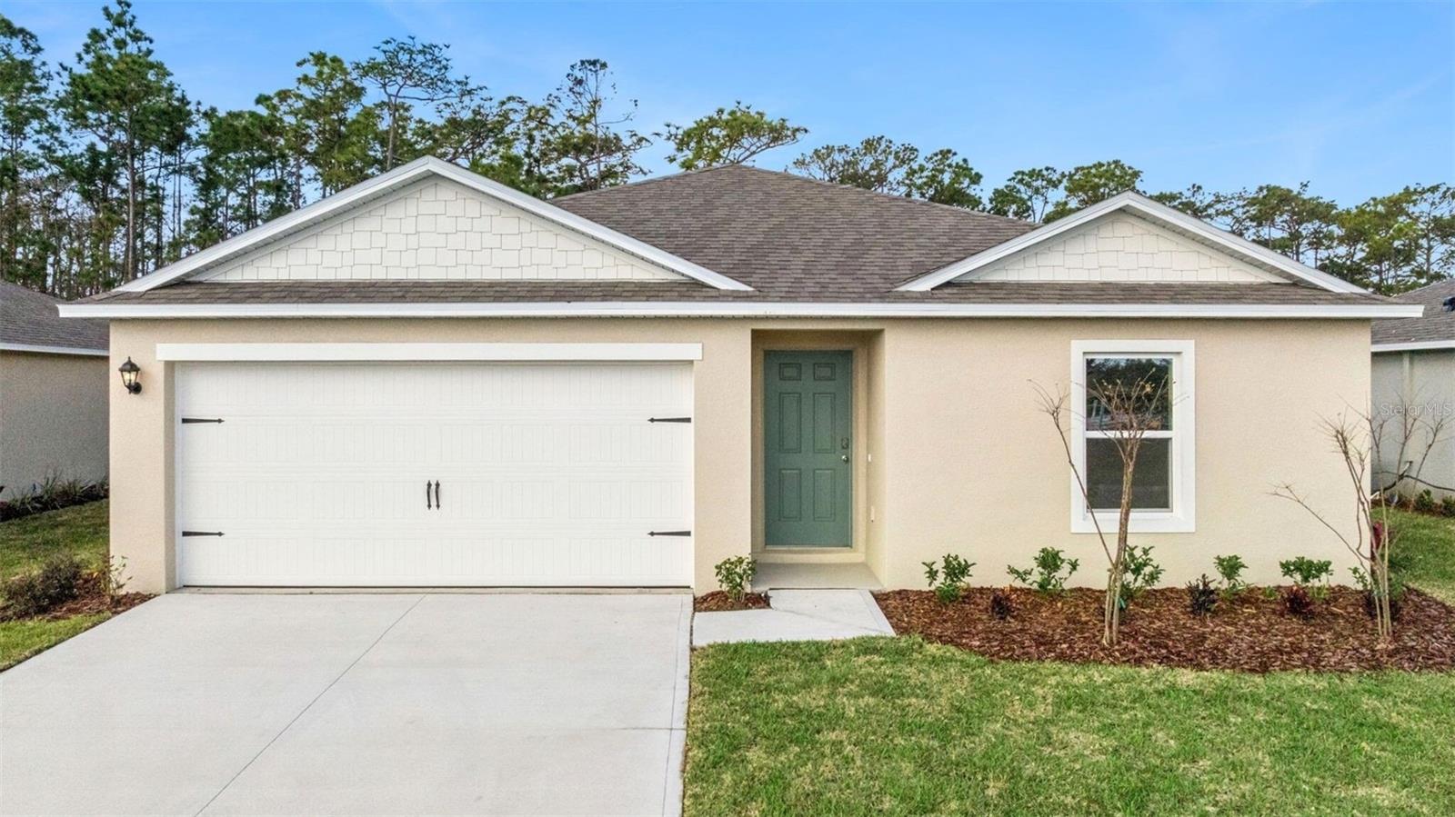 Gardenside at Ormond Station presents the Freeport. This all concrete block constructed, one-story layout optimizes living space with an open concept. As you enter the foyer you are greeted with two guest bedrooms and guest bathroom with a vanity sink. Linen closet is located in between the guest bathroom and guest bedroom, creating easy access.  Take a walk down the hallway and you are greeted with bedroom 4, private space for washer and dryer and an entrance to the 2 car garage. The well-appointed kitchen overlooks the great room and patio making entertaining a breeze. This community has stainless steel appliances, making cooking a piece of cake. Bedroom one, located off the great room in the back of the home for privacy. The bedroom one bathroom impresses with a vanity, and spacious shower/tub space as well as a spacious walk in closet. Like all homes in Gardenside at Ormond Station, the Freeport includes Smart home technology package which allows you to control your home with your smart device while near or away. 

*Photos are of similar model but not that of exact house. Pictures, photographs, colors, features, and sizes are for illustration purposes only and will vary from the homes as built. Home and community information including pricing, included features, terms, availability and amenities are subject to change and prior sale at any time without notice or obligation. Please note that no representations or warranties are made regarding school districts or school assignments; you should conduct your own investigation regarding current and future schools and school boundaries.*