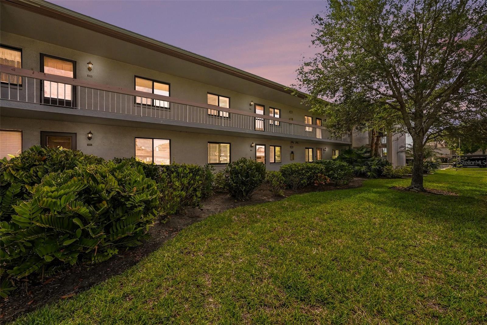One or more photo(s) has been virtually staged. Welcome to this beautifully maintained 2 bedroom, 2 bathroom second-floor condo located in the highly desirable gated community of East Lake Woodlands. This immaculate home features upgraded luxury vinyl plank flooring throughout and offers a serene, peaceful pond view perfect for relaxing mornings or evenings. Residents enjoy access to an exceptional lifestyle with two championship 18-hole golf courses, 14 Har-Tru tennis courts, and a stunning country club. Ideally situated near world-class beaches, scenic nature parks and preserves, and with convenient access to shopping and dining, this home is the perfect opportunity to embrace the best of the Florida lifestyle.
