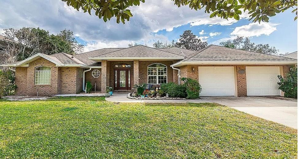 Welcome home to 5963 Boggs Ford in Port Orange.  This immaculate home is located directly on the Spruce Creek and features a dock, 4 bedrooms and 3 full baths.  10 ft ceilings and a desirable open/split bedroom floor plan are among its many appealing attributes.  The inground pool is screened in and is ideal for entertaining or just relaxing after a long day.  Additional features include; granite counters, formal dining room and 2 bay oversized garage all in the affable community of Skylake Estates with low HOA annual dues. ;Water: City
