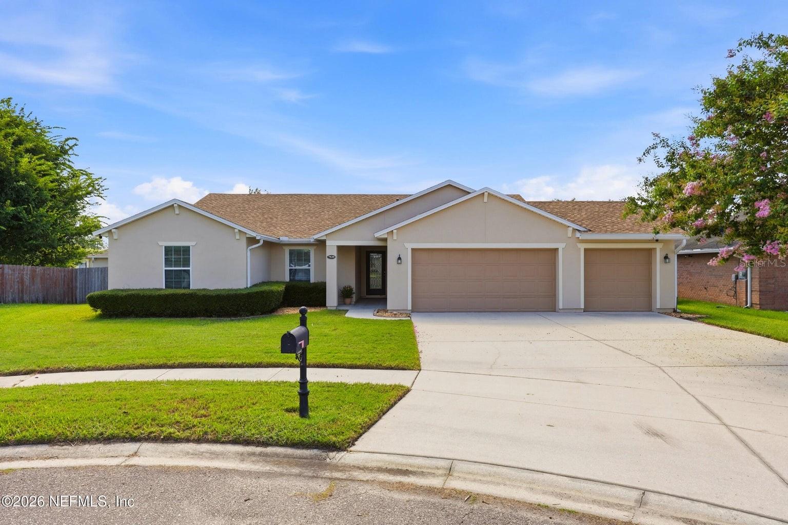 Welcome to this beautifully maintained home in the sought-after Westland Oaks community! Designed for comfortable living & entertaining, this spacious home features an open-concept floor plan w/a large family room that flows seamlessly into the kitchen. The kitchen offers a center island perfect for casual dining, abundant cabinet space & 42'' cabinets. The private owner's suite serves as a relaxing retreat with 2 walk-in closets & en-suite bath remodeled 2 years ago. A split-bedroom layout provides added privacy for family members or guests. Step outside to the covered screened lanai, the above ground pool & fire-pit. Additional highlights include a 3-car garage, NEW ROOF IN 2026, 4 year old A/C unit, ample storage, and no CDD fees. Conveniently located near I-295, NAS Jacksonville, shopping, dining & everyday conveniences, this home offers the ideal blend of space, comfort & location.