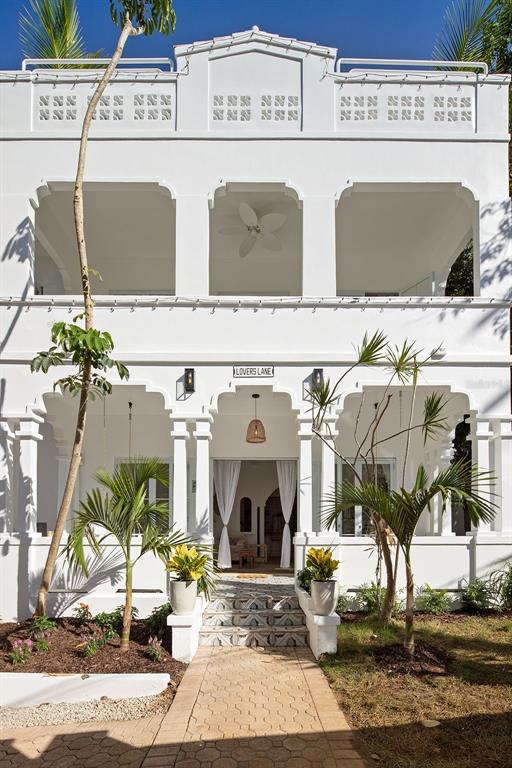 A stunning and spacious newly remodeled residence in Condado! This grand home, with unique architectural features, has been given a complete makeover. Sold completely furnished and equipped.

The main floor of the home is open living, kitchen, and dining areas that open onto patio gardens and the pool. The second floor has three bedrooms, two bathrooms, and an enormous master suite with private balcony.  The third floor has two more bedrooms and a large entertainment space that opens on to the rooftop.  The property also has a fully furnished 2 bedroom apartment with a private entrance that can be used as a guest house, home office/gym, or rental investment.

Located on a quiet street just around the corner from restaurants, shopping, the beach, and two of the best private schools in Puerto Rico.
