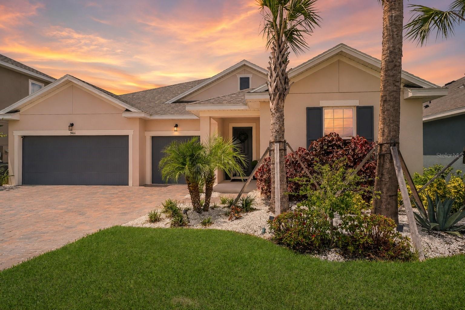 Preferred Lender is offering 1% of the loan amount as a lender credit towards buyers closing costs or interest rate buy-down on this specific home! Welcome to Seaire, an exciting lagoon community where resort-style amenities bring the ultimate vacation-at-home lifestyle to Parrish. At the heart of the community is a stunning 4-acre, crystal-clear Metro Lagoon featuring sandy beaches, swimmable waters, kayaking, paddleboarding, a swim-up bar, water slides, private cabanas, an in-water obstacle course, and year-round events. Located minutes from I-75 and I-275, Seaire provides easy access to Bradenton, Sarasota, St. Petersburg, Tampa, shopping, dining, schools, and the Gulf beaches of Anna Maria Island.

Why wait for new construction when this exceptional 2024 home is move-in ready with over $175,000 in designer and lifestyle upgrades already completed? Showing like a model home, this impressive 4 bedroom, 3 bathroom residence offers nearly 2,700 sqft of living space on a premium lakefront lot with breathtaking panoramic water views.

As you arrive, professional landscaping, a pavered driveway, and impressive curb appeal welcome you home. Stepping inside, the foyer features beadboard wainscoting, designer paint, and stylish finishes that continue throughout. Wood-look tile flooring flows through the main living areas, office, owner’s suite, and owner’s closet, creating a cohesive and sophisticated feel.

The kitchen is sure to impress with quartz countertops, an oversized island, KitchenAid stainless steel appliances, a custom stainless steel vent hood, under-cabinet lighting, subway tile backsplash, and ample cabinetry. The living room features custom built-in cabinetry, an electric fireplace, and expansive sliding glass doors framing the peaceful water views. A built-in home theater provides the ultimate entertainment experience with a 100-inch projection screen and surround sound system.

The owner’s suite serves as a private retreat featuring a custom board and batten accent wall, tray ceiling, and waterfront views. The spa-inspired ensuite bathroom offers dual vanities and a massive two-person, seamless glass-enclosed shower complete with dual rain showerheads, dual wall-mounted showerheads, and two built-in benches. The spacious walk-in closet has been professionally customized with a built-in organization system. The split bedroom floorplan provides much-desired privacy for family members and guests.

Step outside to your private backyard paradise featuring a brand-new heated pool and spa surrounded by beautiful new pavers and an expansive seamless screen enclosure designed to preserve the unobstructed water views. The pool, spa, lighting, and additional smart-home features can be controlled directly from your smartphone. Whether you are enjoying your morning coffee, cooling off on a sunny Florida afternoon, entertaining guests, or unwinding in the spa, this outdoor space was designed to be enjoyed year-round.

Skip the construction process, builder delays, and expense of completing upgrades after closing. This extraordinary home combines the benefits of new construction with over $175,000 in custom upgrades, premium waterfront living, smart-home technology, and a luxurious outdoor retreat already waiting for you. Schedule your showing today!