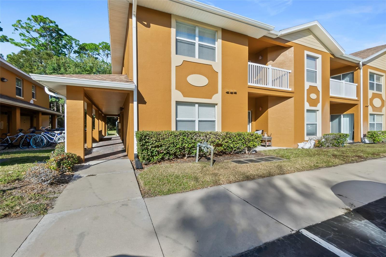 Beautifully done second floor unit that has views of the preserve. This 2-bedroom 2 bath. Carpet, laminate, and tile floors, all windows have blinds and ceiling fan, lights, granite countertops, covered patio balcony. This unit is in a great location close to the Target plaza and many other nearby stores. A short distance to the hospital, BJ's and 95.