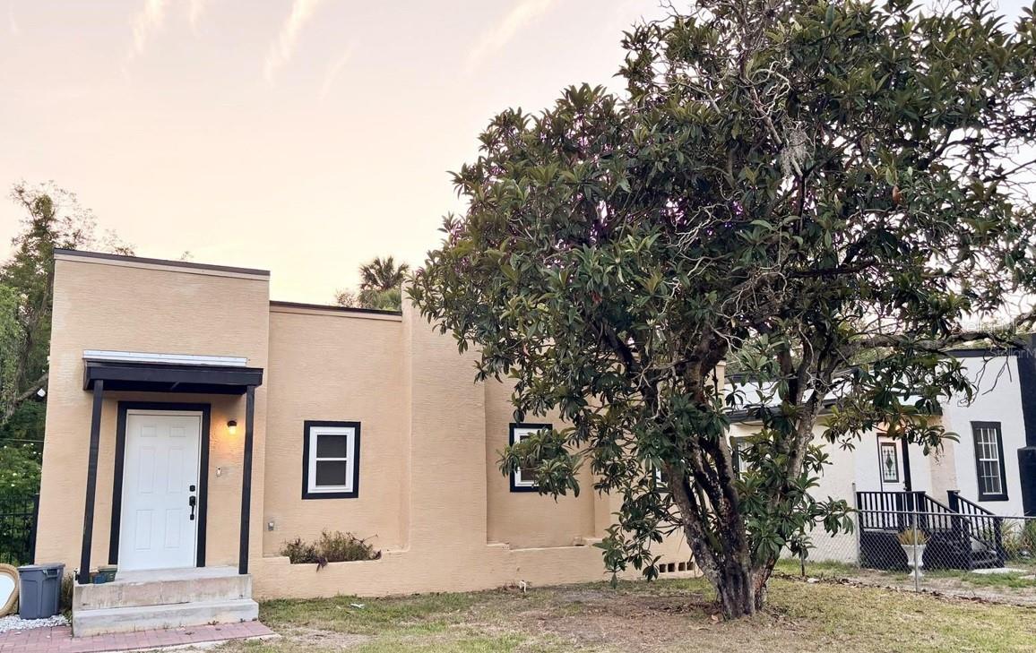 Short Sale. Experience the charm of Historic Downtown Sanford with this beautifully updated 3-bedroom, 2-bath home situated on an oversized 0.21-acre lot in one of Seminole County’s most desirable and walkable locations. Offering 1,218 square feet of thoughtfully designed living space, this property combines historic character with modern updates and exceptional flexibility thanks to its desirable zoning and no HOA.

Inside, you’ll find a bright and inviting interior featuring new windows installed in 2025, luxury vinyl plank flooring throughout, updated bathrooms, and a beautifully renovated kitchen designed to impress. The kitchen showcases 42-inch cabinetry, elegant quartz countertops, stainless steel appliances, and a dedicated bar and beverage area—perfect for entertaining or enjoying everyday living.

The private primary suite offers a peaceful retreat with direct access to an outdoor deck overlooking a tranquil creek setting, creating the perfect space for morning coffee or relaxing evenings outdoors.

The expansive lot provides added outdoor potential and flexibility while maintaining privacy and a natural setting rarely found this close to downtown.

Location is truly unmatched. Just minutes from Lake Monroe, the Sanford Riverwalk, and Historic Downtown Sanford, you’ll enjoy easy access to award-winning restaurants, local breweries, art galleries, boutique shopping, and year-round events, including the Sanford Art Walk, Food Truck Fiesta, festivals, and community gatherings that make Sanford one of Central Florida’s most vibrant destinations.

Commuters will appreciate quick access to I-4, Downtown Orlando, Orlando Sanford International Airport, and the Lake Mary business corridor.

Whether you're searching for a primary residence, second home, or investment opportunity, this move-in-ready property offers character, modern updates, zoning flexibility, and an unbeatable location. Property is being sold As-Is.