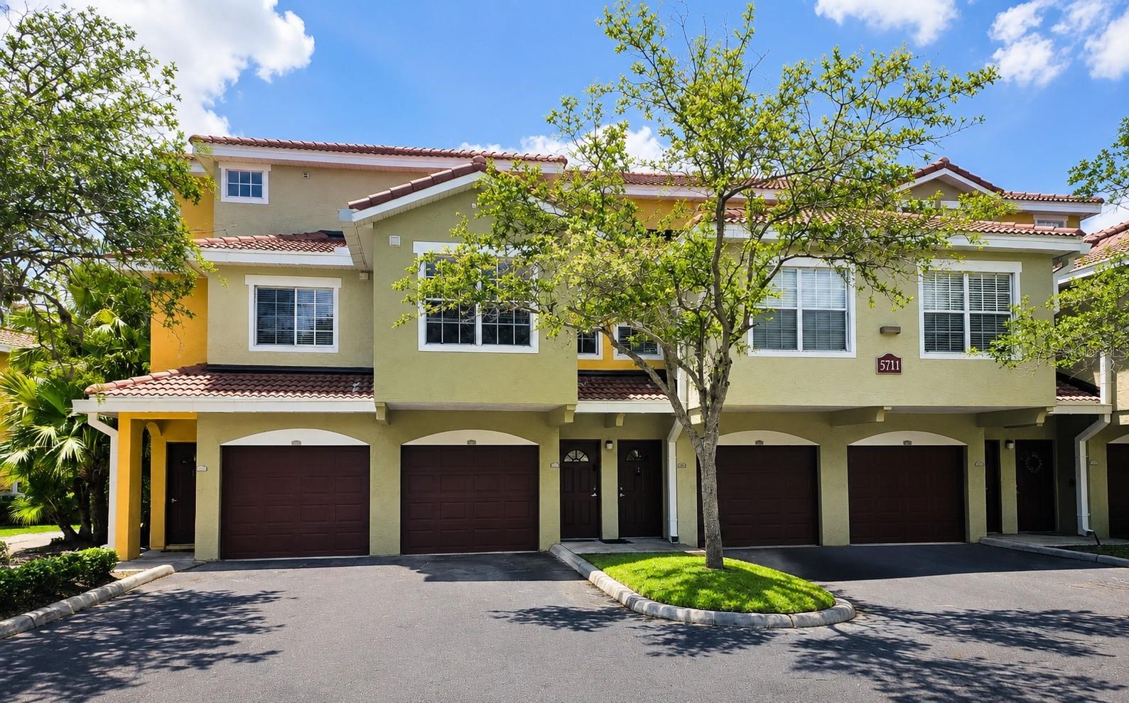 Lease to Own available! Two-bedroom two bath townhome in the popular gated community of Las Palmas. The luxury condominium community of Las Palmas has a superior Sarasota location in close proximity to UTC Mall, Benderson Park, popular local golf courses, downtown activities and local beaches! This gated, resort community offers not one but two heated pools, two gyms, a clubhouse, pickleball, tennis, walking trails, dog park, and playgrounds. The two-bedroom townhouse has a beautiful preserve view from the large, screened lanai. There is a one car garage on first level, large enough to store all your toys and car. The second level has the open kitchen, living room and dining room and a guest bedroom and bath. The 3rd floor has the primary suite with the large bath and walk in closet. The kitchen boasts wood cabinets, quartz countertops and new stainless appliances. This community offers an affordable Florida lifestyle for both the first-time buyer or retiree. Large pets are welcome! Why rent when you can own this home for less, call and ask about the affordable terms.