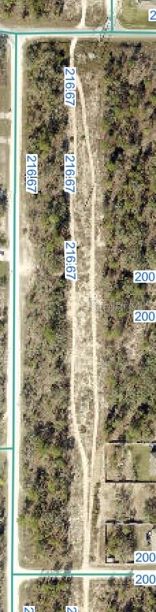 This 2.90 acre parcel that is the easement for the power lines. Zoned R1C. You cannot build on it...but you can play on it and use it for your enjoyment. Best buyer is a home-owner whose lot adjoins it or hold it for possible future investment.
The power company must have access to it at all times for maintenance. Cash only. The property is being transferred with a quit claim deed with no owner's title policy, and if the buyer wants any other deed or title policy, they have to pay for those closing costs