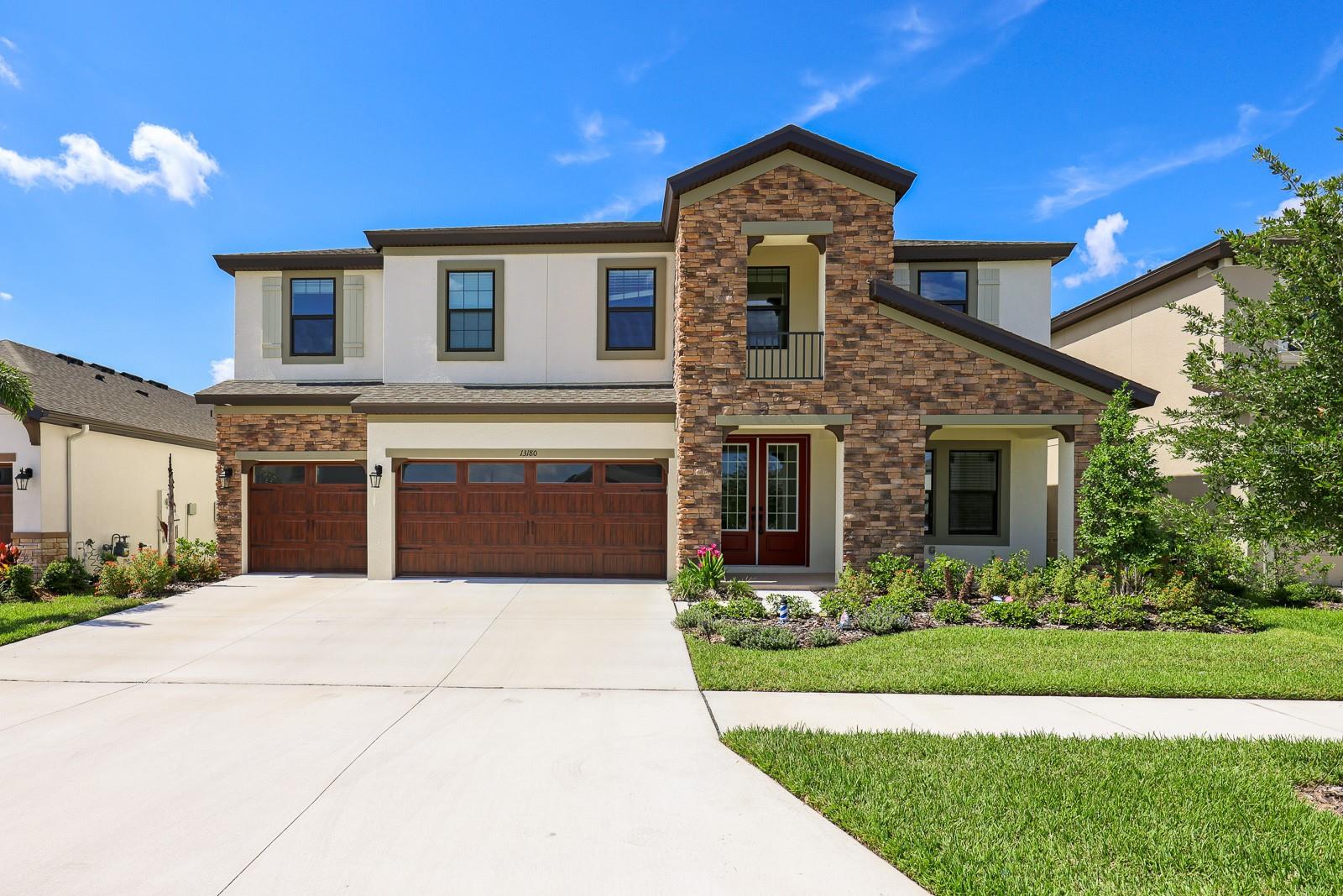 Welcome to this newly built 2025 two-story home, ideally situated on a quiet cul-de-sac and designed for modern Florida living. Offering 5 bedrooms, 4 bathrooms, and a dedicated office/den off the entry, this spacious home combines comfort, style, and functionality.

The open-concept floor plan seamlessly connects the grand room, expansive kitchen, and breakfast area, creating the perfect space for everyday living and entertaining. Sliding glass doors lead to a covered lanai overlooking a fully fenced backyard with no rear neighbors, providing added privacy and outdoor enjoyment.

The chef-inspired kitchen features a gas cook-top with stainless steel range hood, built-in microwave and oven, wine refrigerator, walk-in pantry, modern pendant lighting, and an over-sized island with sink and seating that overlooks the family room.

A private guest suite and full bathroom are conveniently located on the first floor, ideal for visitors or multi-generational living. Ceramic tile flooring extends throughout the main living areas, while plush carpeting adds comfort to all bedrooms and the second level.

Upstairs, you'll find spacious secondary bedrooms with walk-in closets, a large bonus room, and a conveniently located laundry room. The owner's retreat offers a luxurious escape with a spacious walk-in closet and an expansive en-suite bathroom.

This exceptional rental home offers the perfect combination of space, privacy, and contemporary design.

Hawkstone residents enjoy the best of both worlds with resort-style amenities while staying close to top-rated Lithia schools, nature preserves, family-friendly activities, US-301, and I-75. 

NOTE: Additional $59/mo. Resident Benefits Package is required and includes a host of time and money-saving perks, including monthly air filter delivery, concierge utility setup, on-time rent rewards, $1M identity fraud protection, credit building, online maintenance and rent payment portal, one lockout service, and one late-rent pass. Renters Liability Insurance Required. Call to learn more about our Resident Benefits Package.