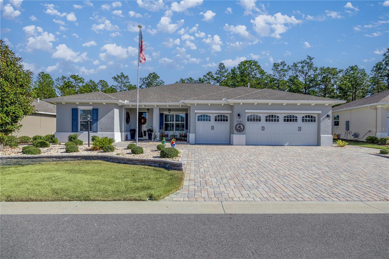 Welcome to On Top of the World, Ocala's premier 55+ active community, where resort style living meets luxury, comfort, and exceptional craftsmanship. This extraordinary home is situated on a premium preserve homesite overlooking peaceful woods and a scenic walking trail, offering unmatched privacy and the opportunity to enjoy beautiful birds and Florida wildlife right from your oversized screened lanai. From the moment you arrive, you'll notice the professionally designed custom landscaping, creating stunning curb appeal that continues into the private backyard retreat. Inside, this home shows like a model and has been meticulously maintained, with the owners sparing no expense in creating a truly one of a kind residence. The open concept floor plan is filled with natural light and enhanced by elegant tray ceilings, crown molding, luxury vinyl plank flooring throughout, plantation shutters, designer lighting, and custom window treatments that complement every room. The spacious great room flows seamlessly into the dining area and gourmet kitchen, creating the perfect space for entertaining or simply enjoying everyday living. The chef's kitchen is a true showpiece, featuring an oversized quartz island, premium cabinetry, abundant storage, top of the line stainless steel appliances, a brand new Bosch induction cooktop, built in wall oven and microwave, designer backsplash, walk in pantry, and generous workspace for the most discerning cook. The luxurious owner's suite is a peaceful retreat with beautiful preserve views, a spa inspired bath, oversized walk in closet, and finishes designed for both comfort and elegance. The guest suite and private office provide flexibility for visitors, hobbies, or working from home. Thoughtful upgrades continue throughout the home, including an expanded laundry room with additional cabinetry and a utility sink, plus an advanced hot water recirculation system that allows you to schedule when hot water is instantly available adding both convenience and energy efficiency. Even the garage has been transformed into an exceptional space with a mini-split air conditioning system, custom installed cabinetry, epoxy flooring, and an additional storage area, making it perfect for hobbies, projects, golf cart storage, or simply staying cool year round. Every room reflects quality, attention to detail, and pride of ownership. This is not a builder-grade home it has been extensively customized with premium finishes and thoughtful improvements that elevate it far beyond new construction. Living in On Top of the World means enjoying one of Florida's most sought after active adult lifestyles, with world class amenities including golf, resort style pools, fitness centers, pickleball and tennis courts, walking trails, restaurants, clubs, arts and crafts, entertainment, and hundreds of social activities designed to keep every day as active or relaxing as you choose. Homes of this caliber, on premium preserve lots with this level of upgrades, are rarely available. If you've been waiting for a truly exceptional home where luxury, privacy, and lifestyle come together, this is the one. Schedule your private showing today and experience why this home stands above the rest.