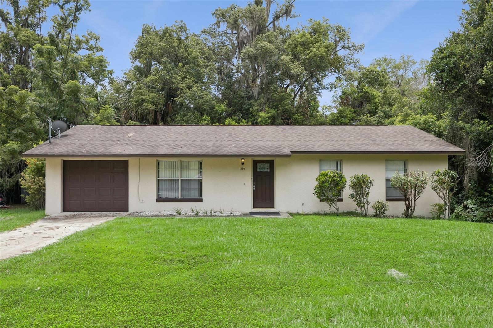 Whether you're searching for your first home or your next investment opportunity, this move-in-ready Orange City gem checks all the boxes! Situated on an oversized 0.32-acre lot, this 3-bedroom, 1.5-bath home offers the ideal combination of comfort, value, privacy, and future potential.
Step inside to discover a bright, functional floor plan featuring durable tile and laminate flooring throughout, an inviting living area, and a spacious kitchen where you'll enjoy views of Mill Lake Park from the large kitchen window. The primary bedroom also overlooks the park, creating a peaceful setting to start and end your day.
One of the standout features of this property is its added privacy, with no rear backyard neighbors. The spacious backyard offers endless possibilities—create your dream outdoor entertaining space, plant a garden, park your boat or recreational toys, or simply enjoy the extra room to spread out.
Enjoy added peace of mind with several major updates already completed, including a brand-new water heater (2026), A/C replaced in 2021, and roof replaced in 2013, helping reduce major maintenance expenses for years to come.
For first-time buyers, this home offers an excellent opportunity to begin building equity instead of paying rent. For investors, the desirable location, generous lot size, and significant system updates make it a smart addition to a rental portfolio or long-term investment strategy.
Conveniently located just minutes from Blue Spring State Park, shopping, dining, schools, SunRail, and I-4, you'll also appreciate being just up the road from a neighborhood dog park, making it easy to enjoy the outdoors with your four-legged companions. With Mill Lake Park nearby and no rear neighbors, this home offers a setting that's increasingly hard to find.
Move in, make it your own, and start enjoying all that Orange City has to offer. Schedule your private showing today!