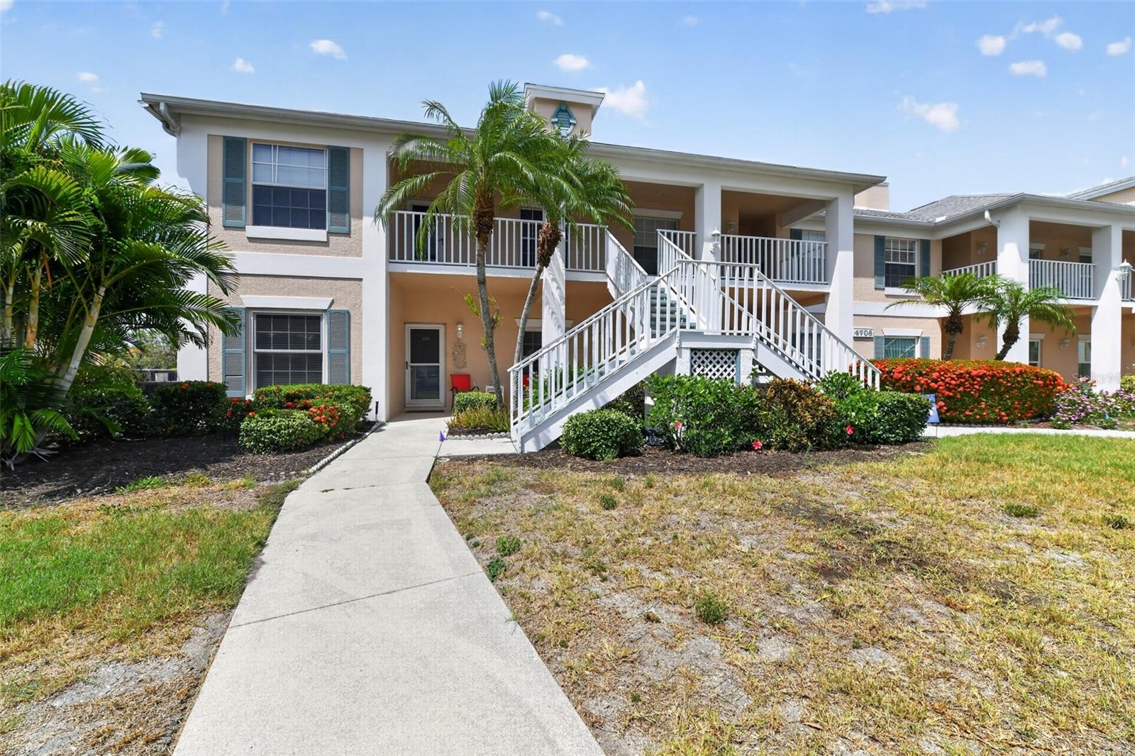 Welcome to this beautifully maintained ground-floor residence offering comfort, convenience, and resort-style living in a highly desirable 55+ active community. This spacious 2-bedroom plus den home combines natural light, thoughtful upgrades, and an inviting layout designed for relaxed Florida living.

Step inside to a bright and airy interior filled with natural light throughout. The versatile den features a built-in bookcase and a queen murphy bed, making it ideal for a home office, reading room, or additional guest space. The open living areas flow seamlessly, creating a comfortable environment for both everyday living and entertaining.

This home has been thoughtfully updated with impact windows and sliders, including a recently redone lanai (approximately 3 years ago) with remote controlled accordion shades that can be managed from inside the condo, providing added safety, energy efficiency, and peace of mind. New compact wood flooring enhances the modern feel throughout the main living spaces, while furnishings make this home truly move-in ready.

The kitchen and appliances have been well maintained, with appliances approximately 6 years old and a dryer replaced 3 years ago. Additional updates include a water heater (6 years old) and an A/C system (9 years old), offering reliable functionality throughout the home.

Located within a vibrant 55+ active community (not gated), residents enjoy an exceptional lifestyle featuring a Par 6, Hole 6 and an 18-hole golf course, as well as multiple pickleball and tennis courts. The community also offers a clubhouse with an on-site restaurant, a tiki bar, water aerobics, and a full calendar of social activities designed for an active and engaging lifestyle. Recent community improvements include newly redone roads, enhancing both appearance and accessibility.

This ground-floor unit offers easy access and a relaxed lifestyle in a beautifully maintained setting. With resort-style amenities, a strong sense of community, and a prime Florida location, this home is the perfect opportunity to enjoy low-maintenance living at its best. Schedule your private showing today!